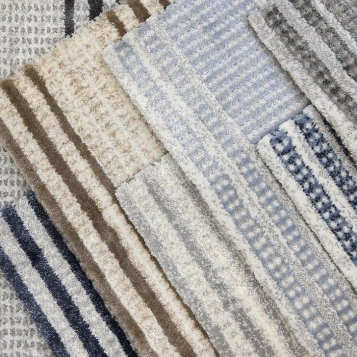 A gorgeous m&eacute;lange stripe with high-low pile, fresh new colors, and ultra-soft hand make this a superb choice for any home!

DavidsCarpetAndTile.com 
405.321.5665