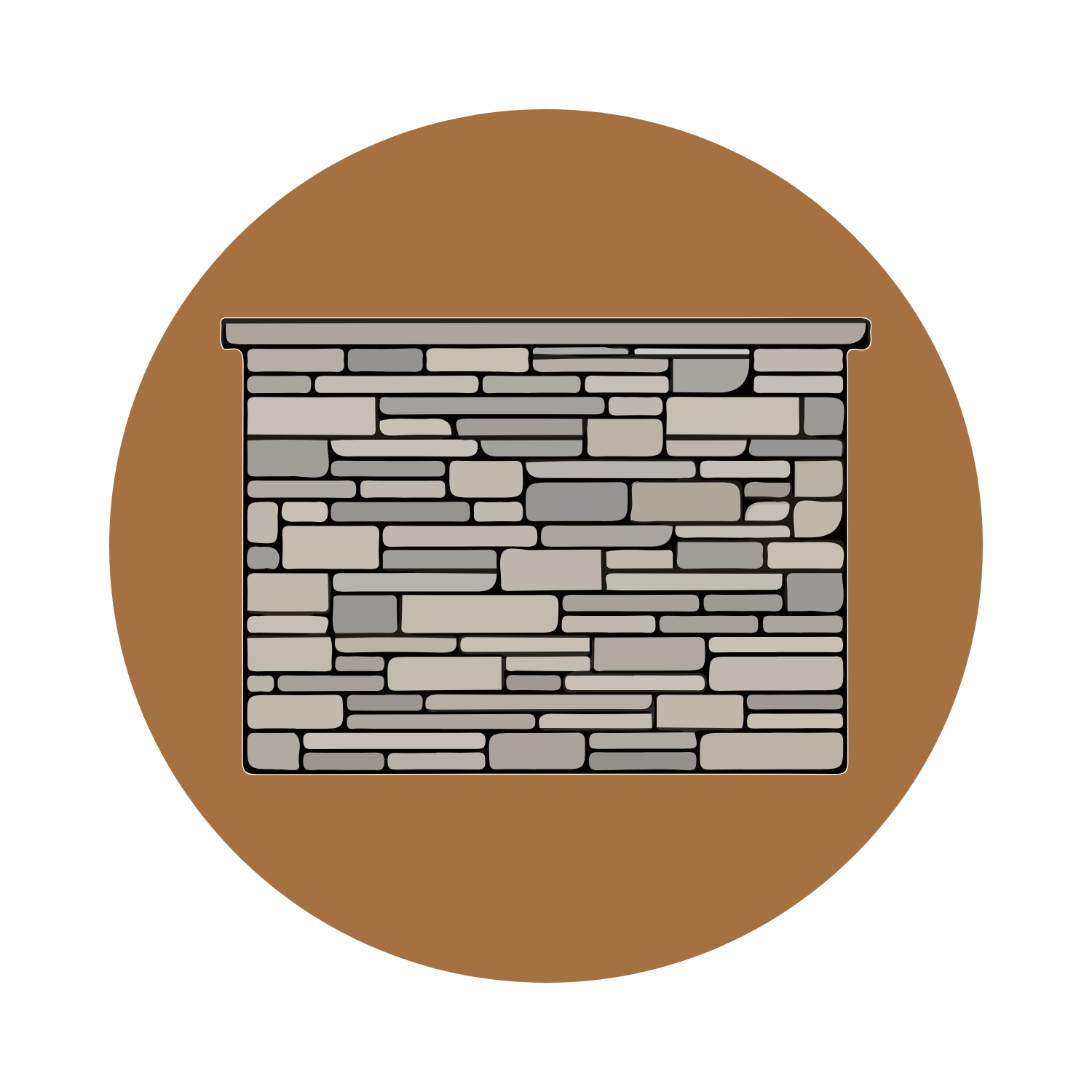 Installation of gray stone wall with a rounded brown mound behind it in Norman, OK
