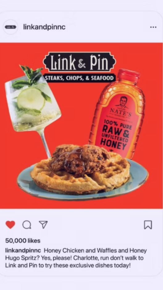 A promotional image for Link & Pin restaurant featuring honey chicken, waffles, a cocktail with lime and mint, and a bottle of raw honey.
