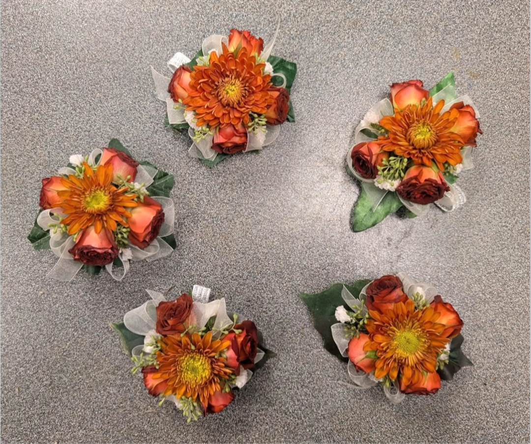 Corsages - cushion mum, spray roses, baby’s breath, eucalyptus & ribbon