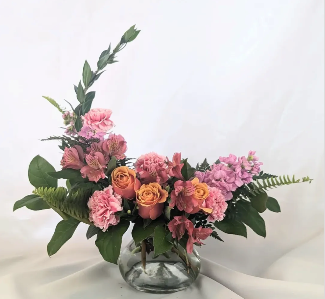 Crescent Moon - bicolor roses, stock, alstroemeria, carnations, myrtle, salal & palm 
