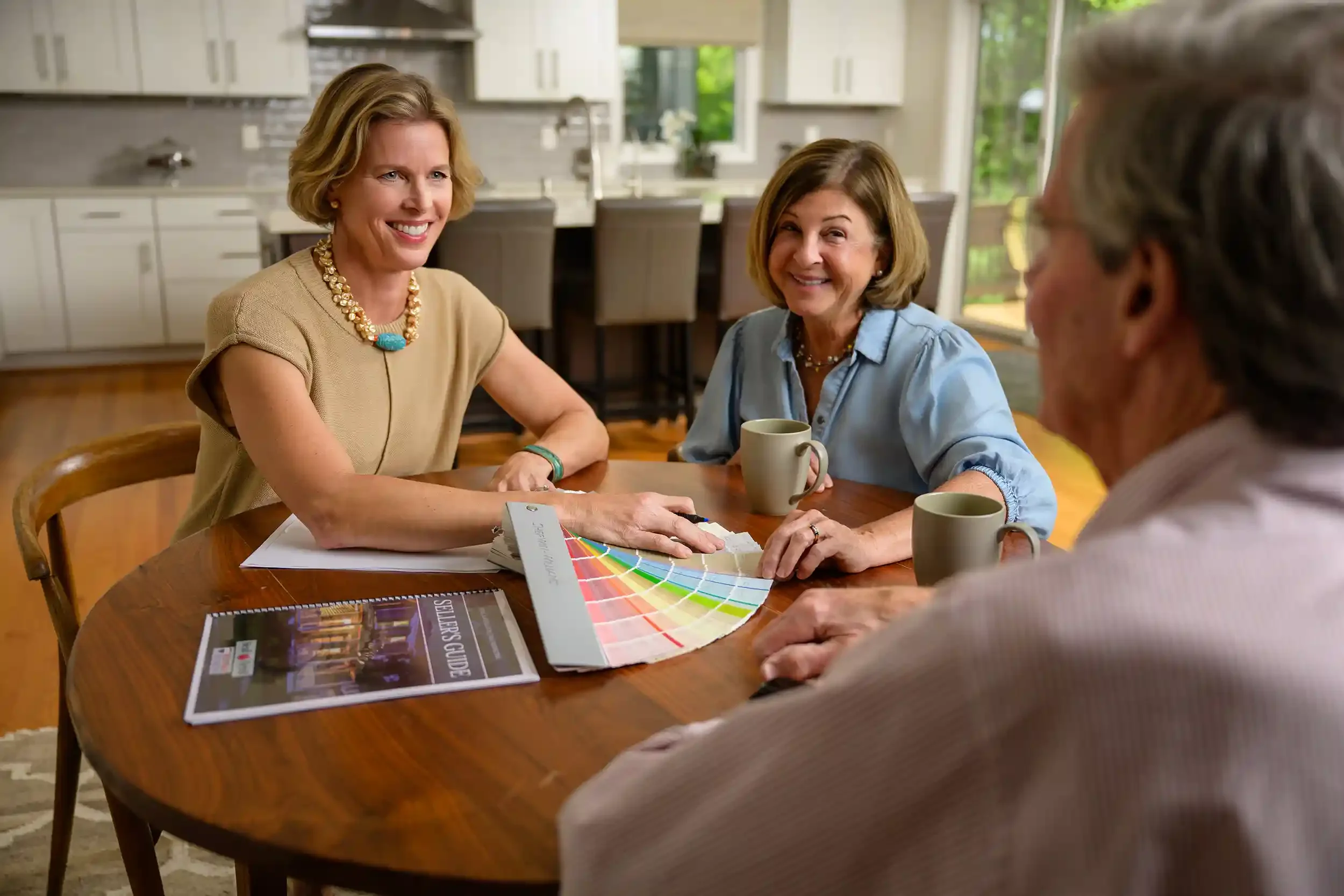 Alex Beall talking with senior downsizing clients