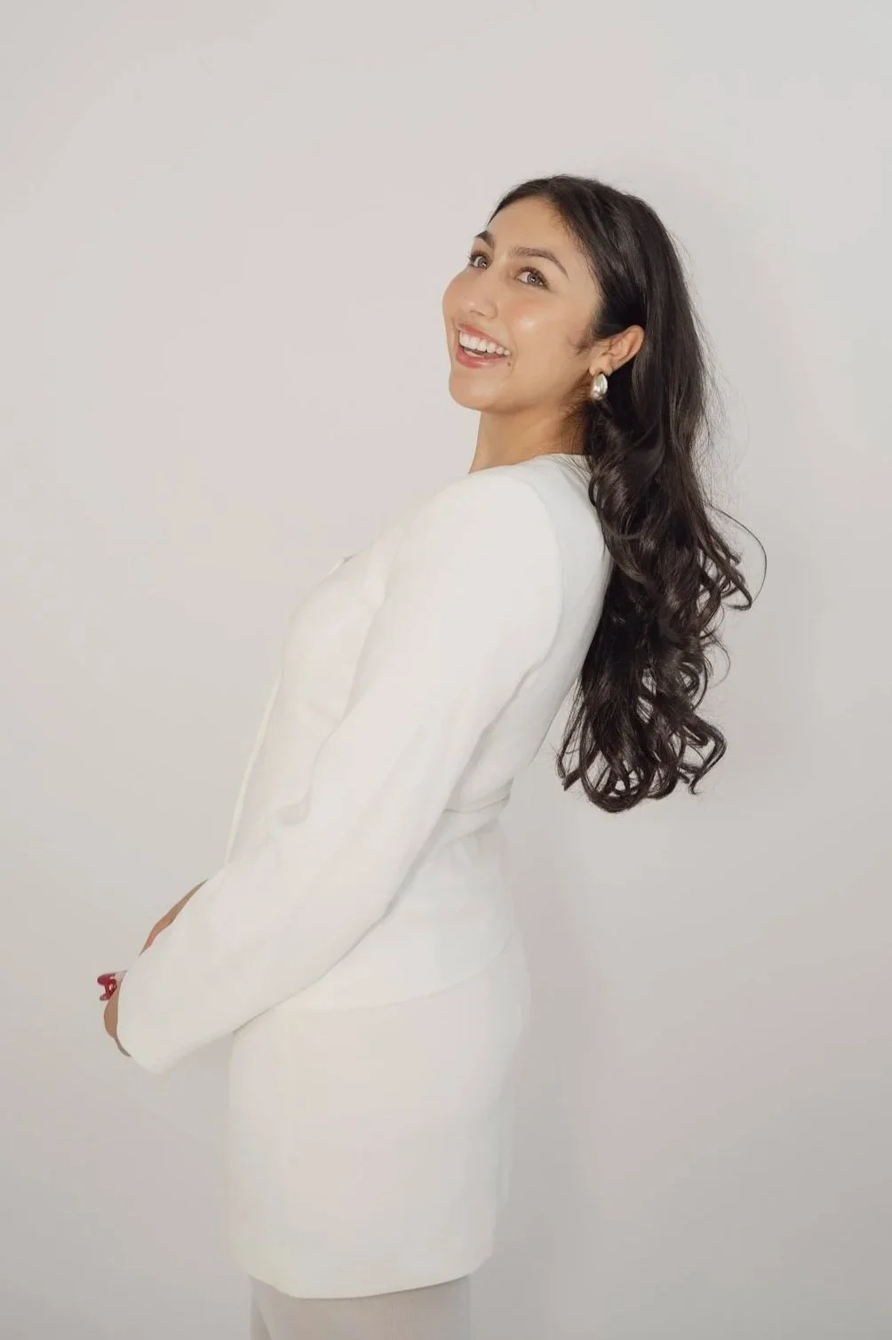 Hailey, social media manager and content creator in Ontario specializing in brand development and website design at Assist-her