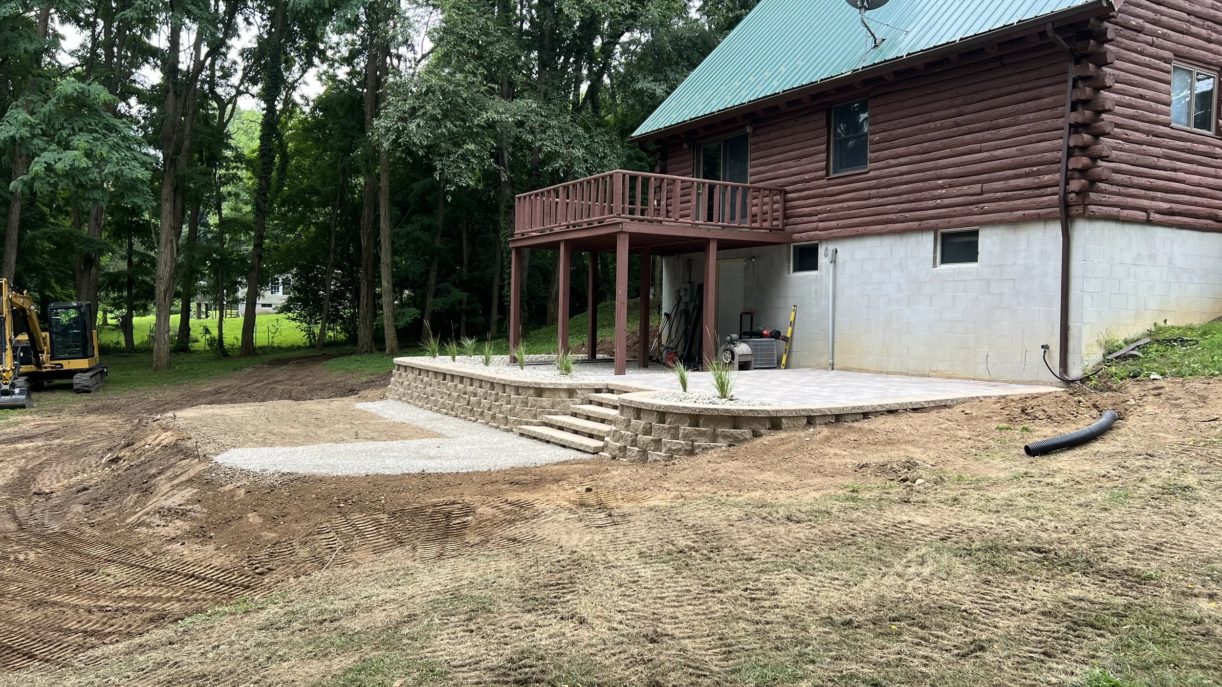 After paver patio and retaining wall construction