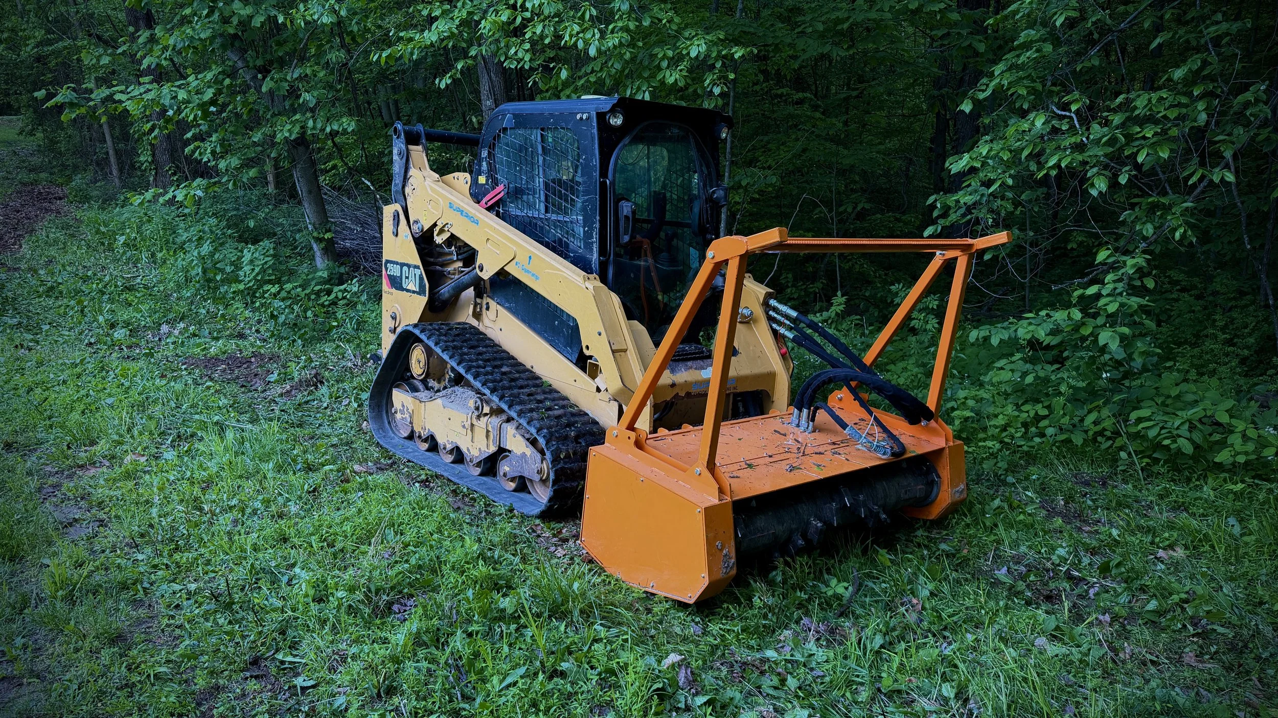 Skid Steer with forestry mulcher