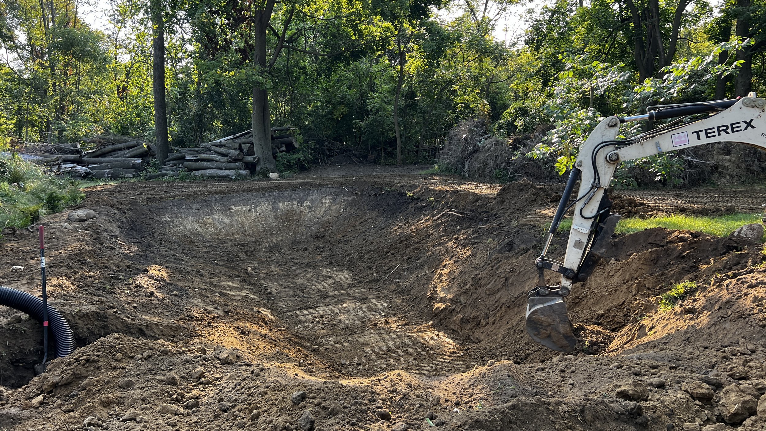 Digging a pond with Mini Excavator