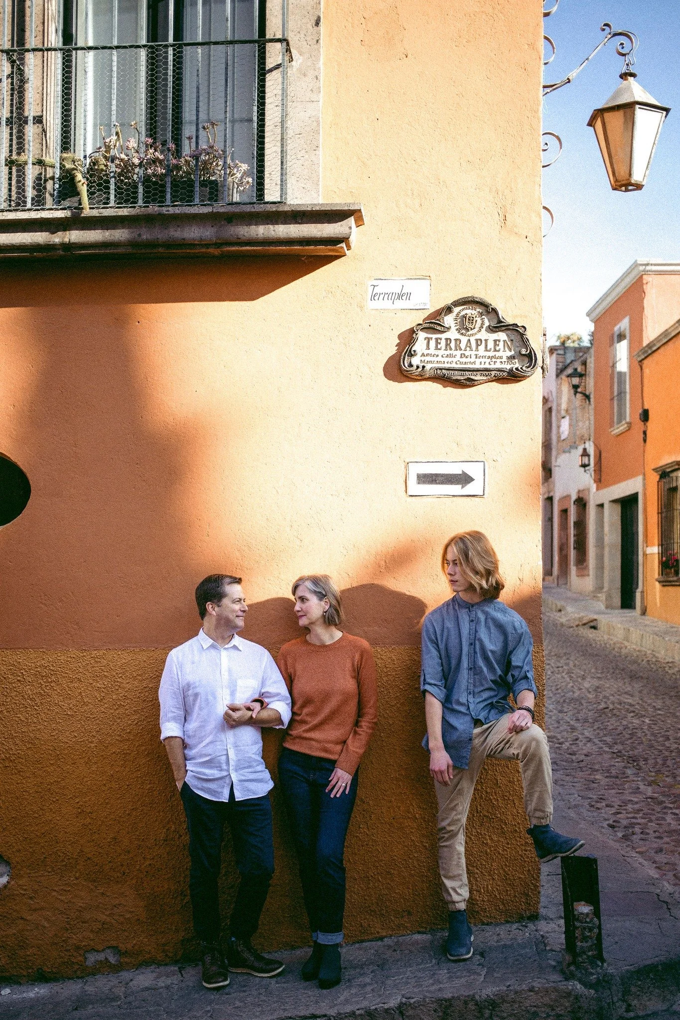 Family on street corner in Mexico