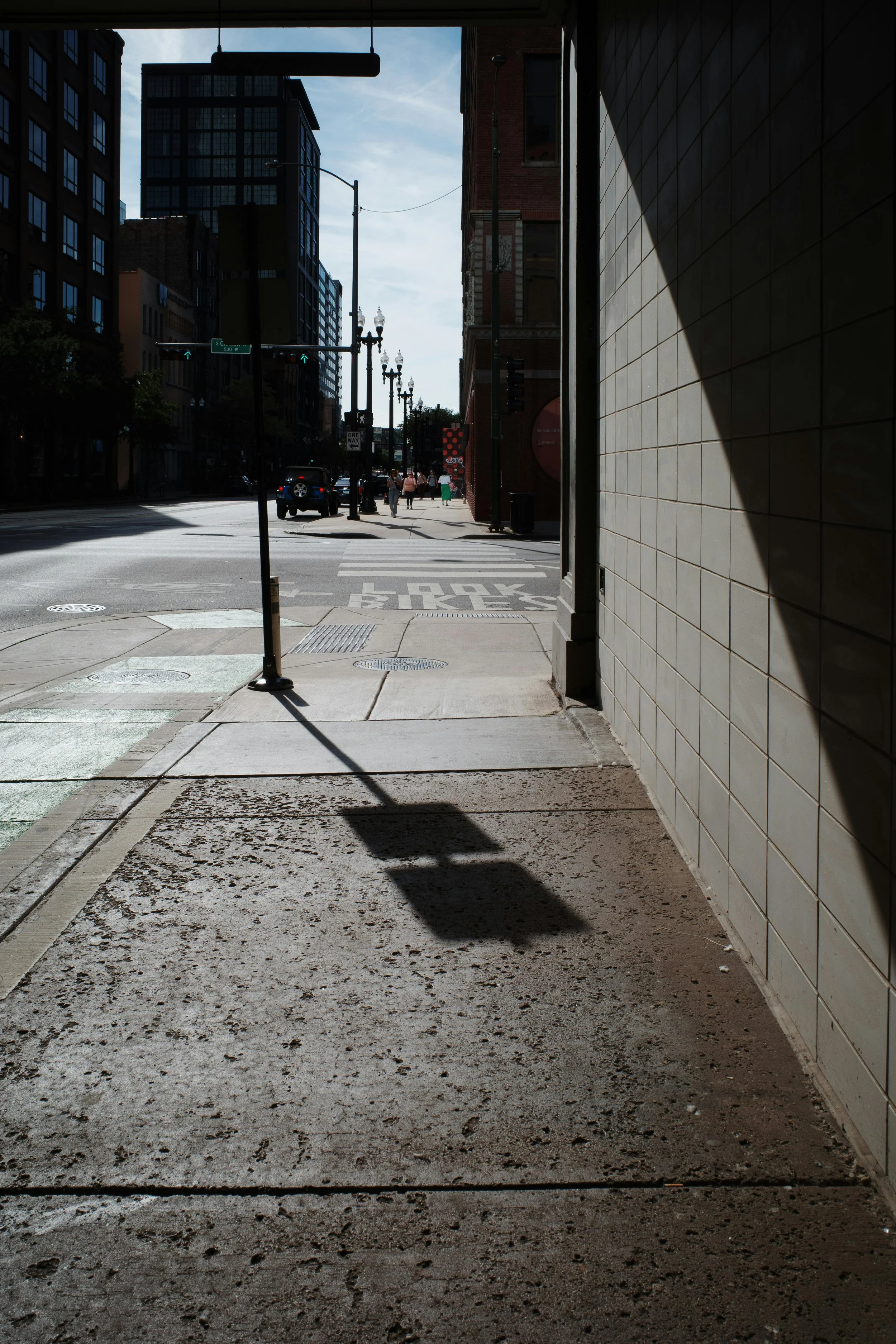 Urban street scene in Baltimore — Plain Text Advisory focuses on urban policy, redevelopment, and neighborhood change.