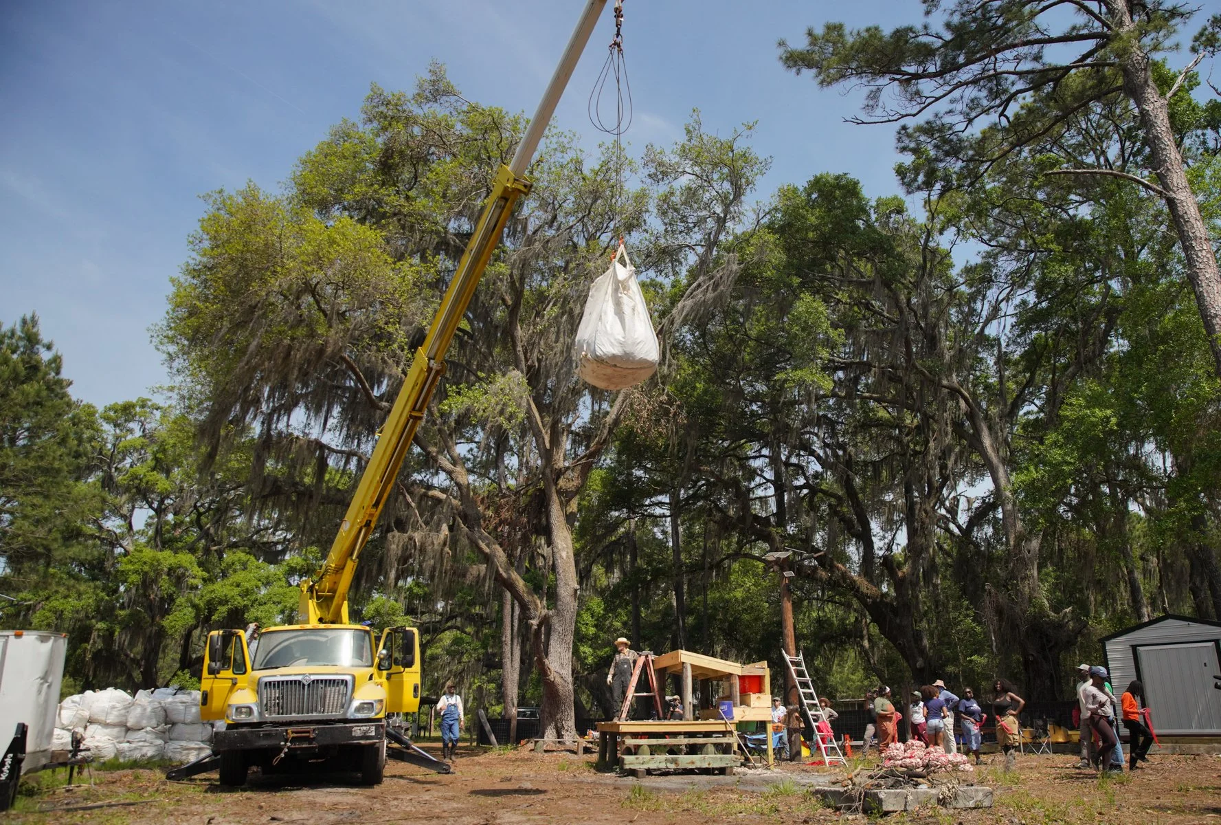 Bag lifted by crane, placing oystershell on Sapelo Island, GA