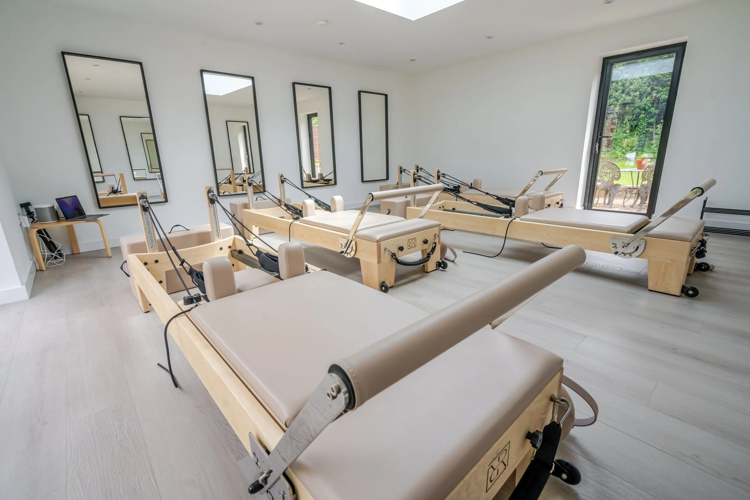 Bright reformer Pilates studio in Whitchurch with boutique Pilates equipment and natural light.