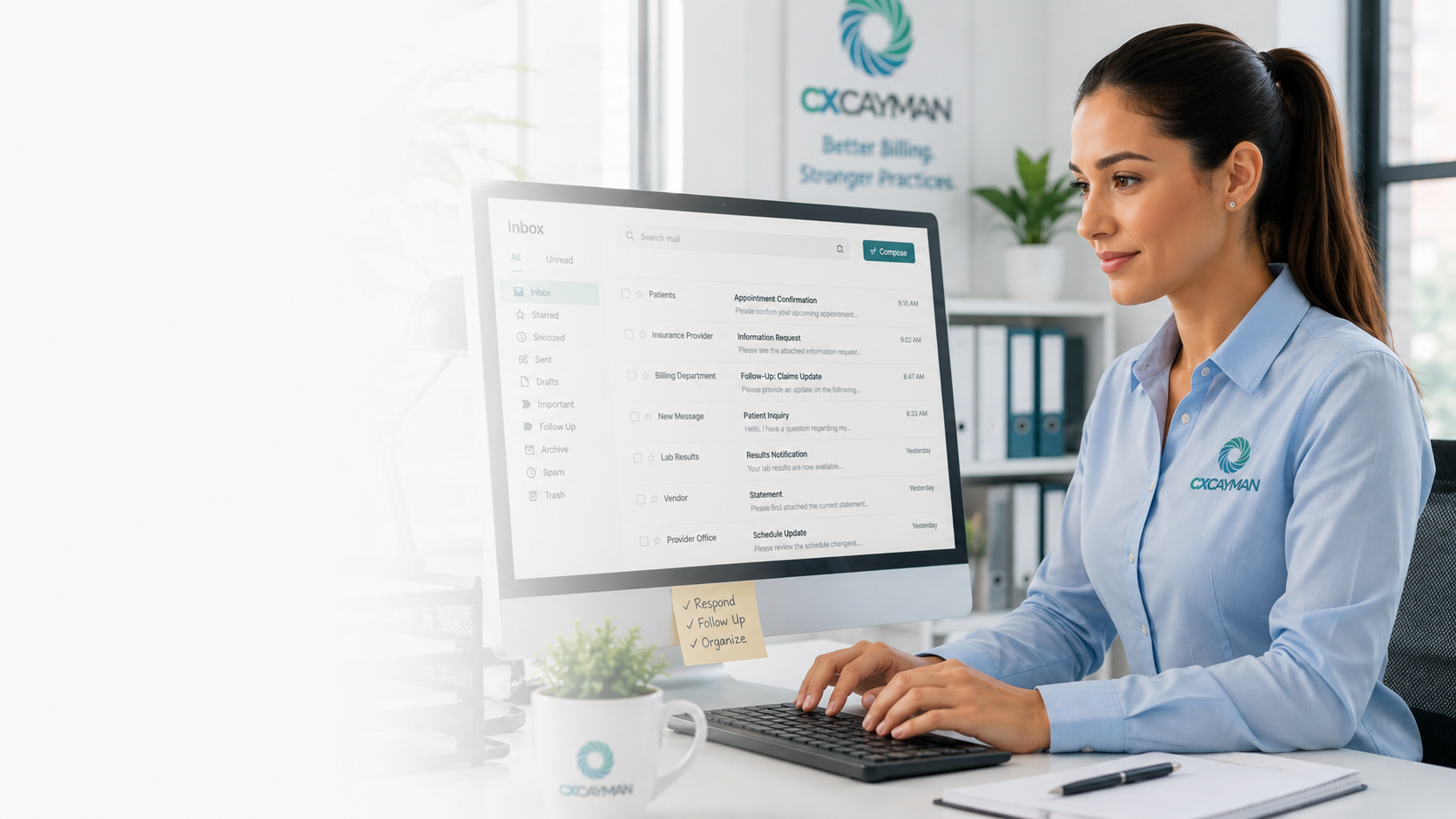 A woman in a light blue shirt with a CDC Cayman logo working on a computer in an office, with email inbox visible on the screen and a white coffee mug with the same logo nearby.