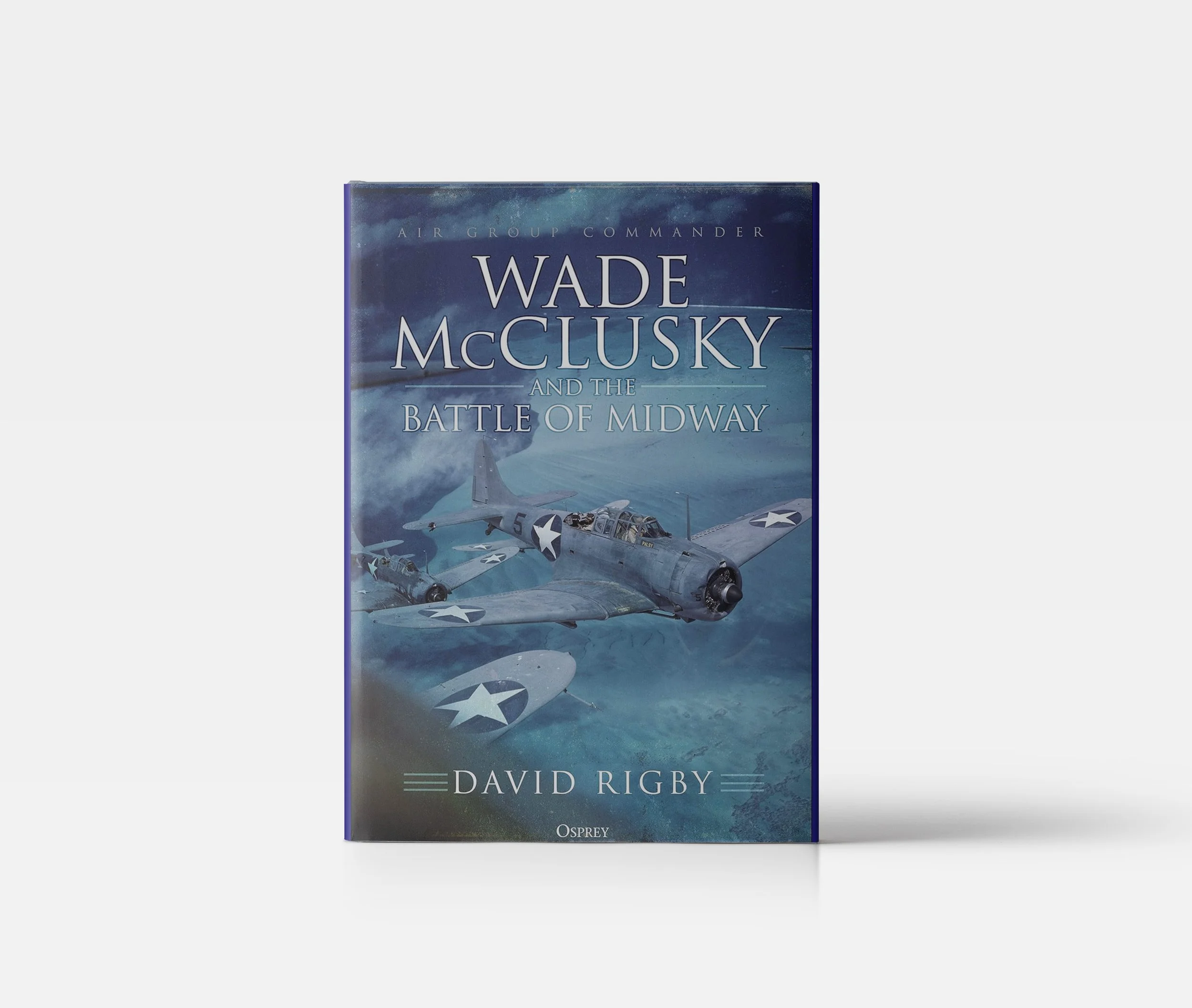 Book cover for 'Wade McClusky and the Battle of Midway' by David Rigby, featuring images of fighter planes in flight over the ocean.