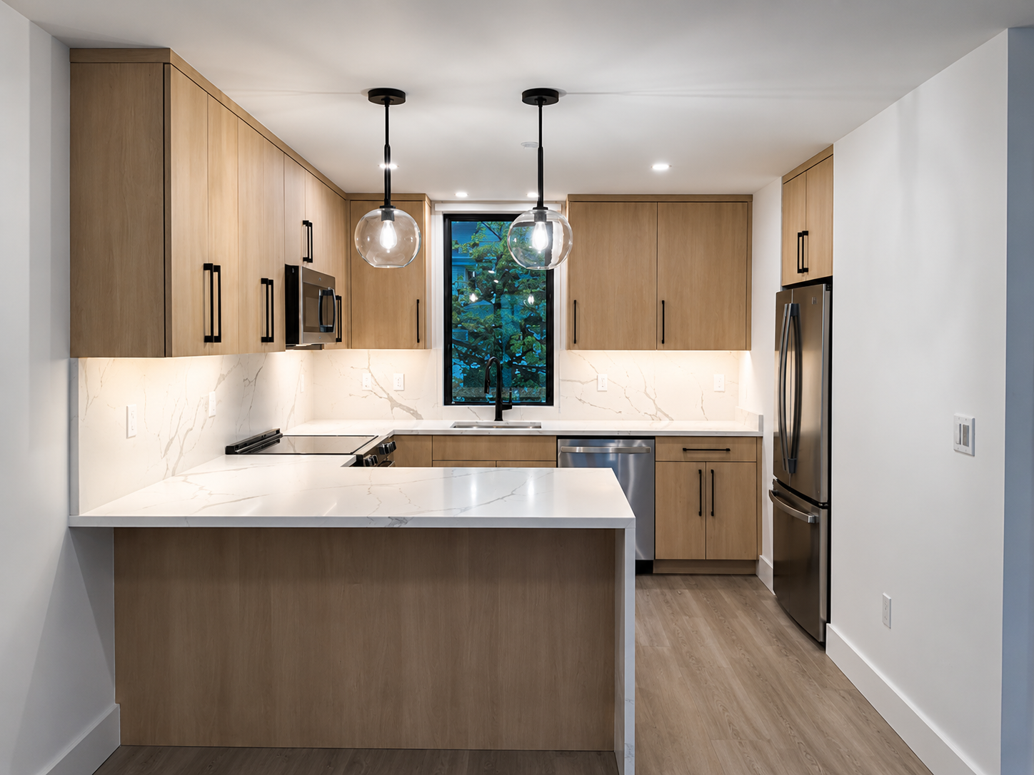 Pleasantville, NY sleek modern kitchen apartment, stainless steel appliances, quartz countertops