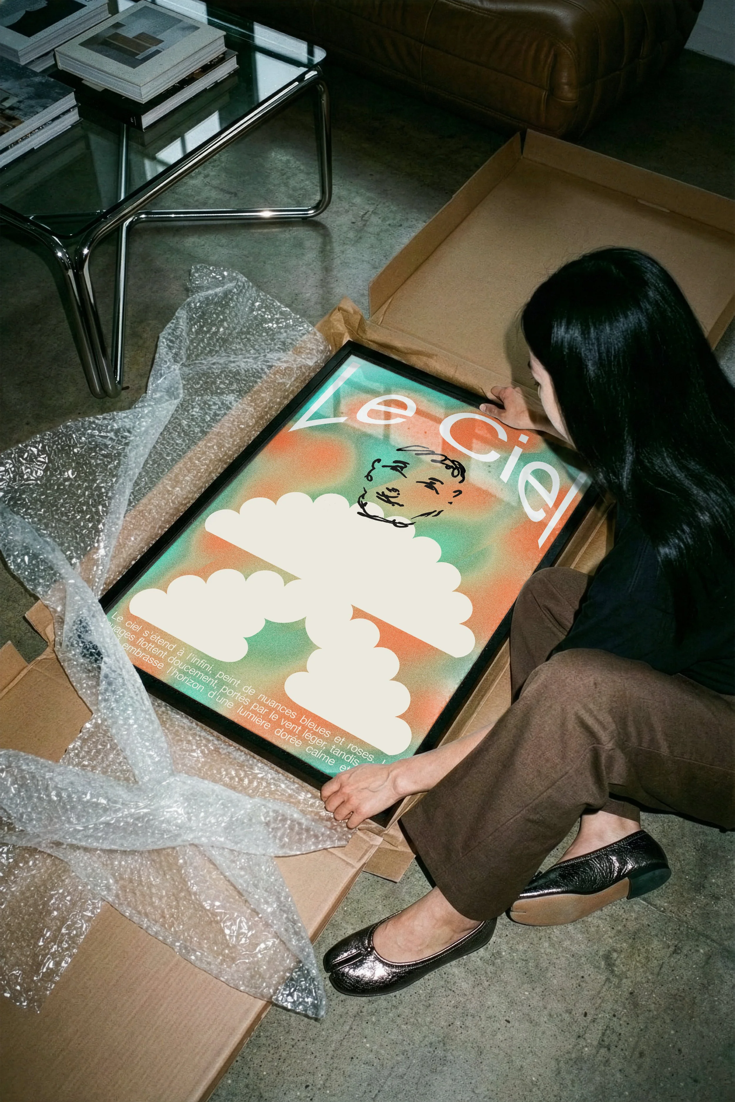 Le Ciel – Unboxing on the floor Frame Mockup by LuxycatStudio.jpg (Copy)