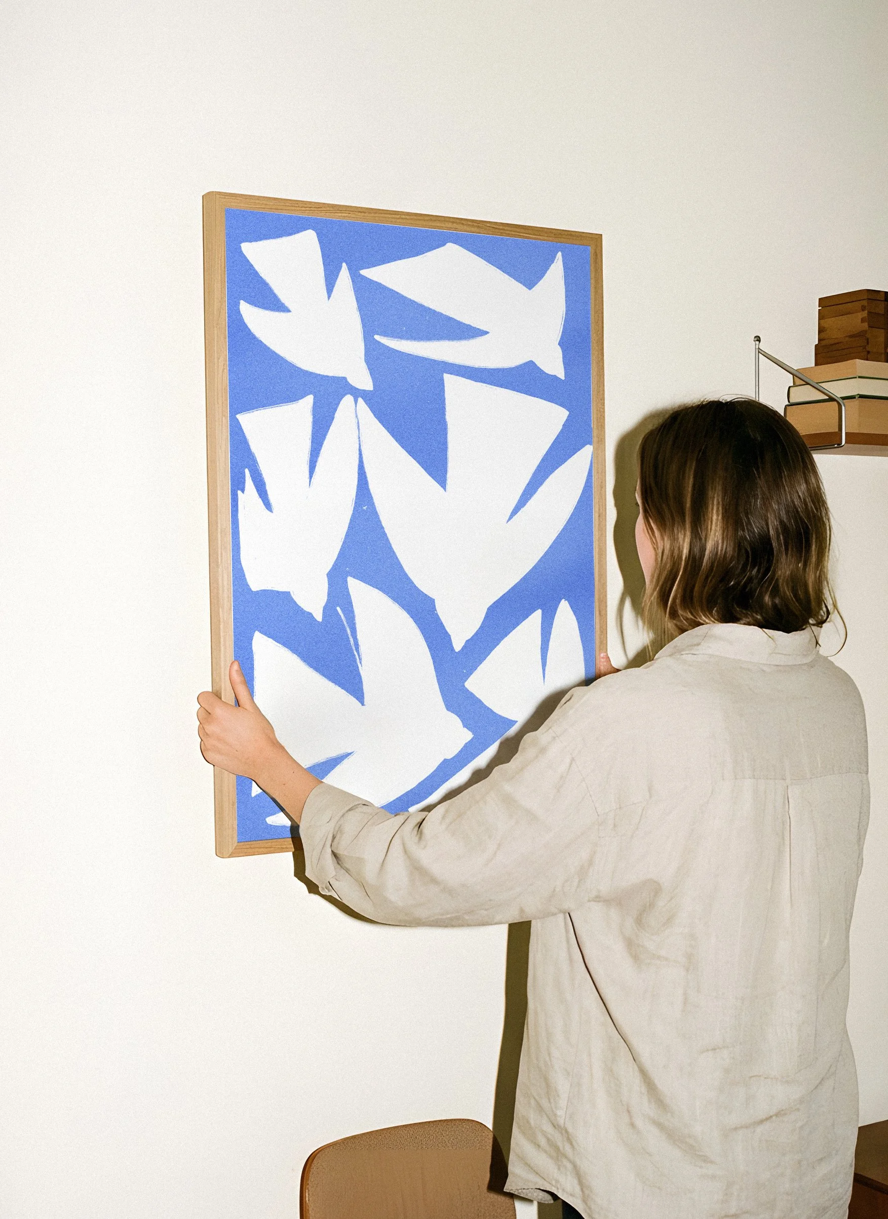 Mockup_birds_moshpit_blue_wall.jpg