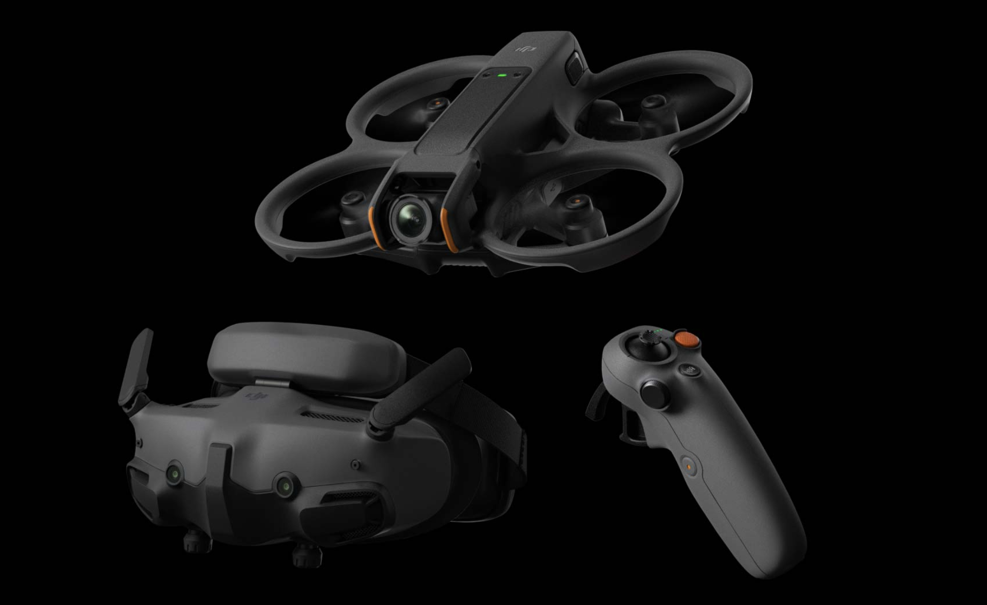 Image of a drone, a virtual reality headset, and a drone controller on a black background.