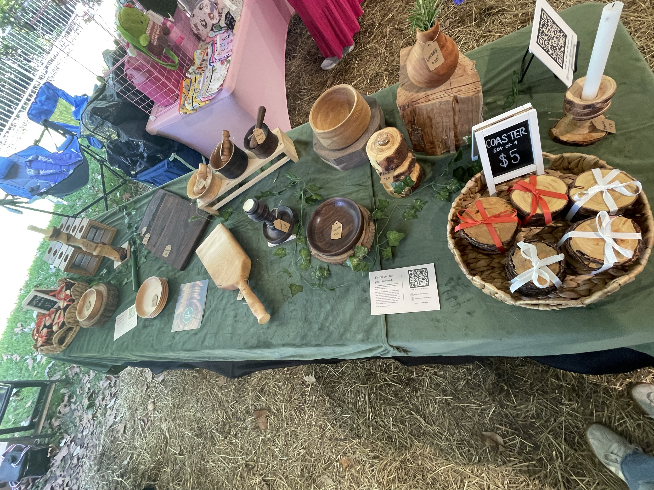 Dark Ember Creations market table aerial view with assorted goods for sales