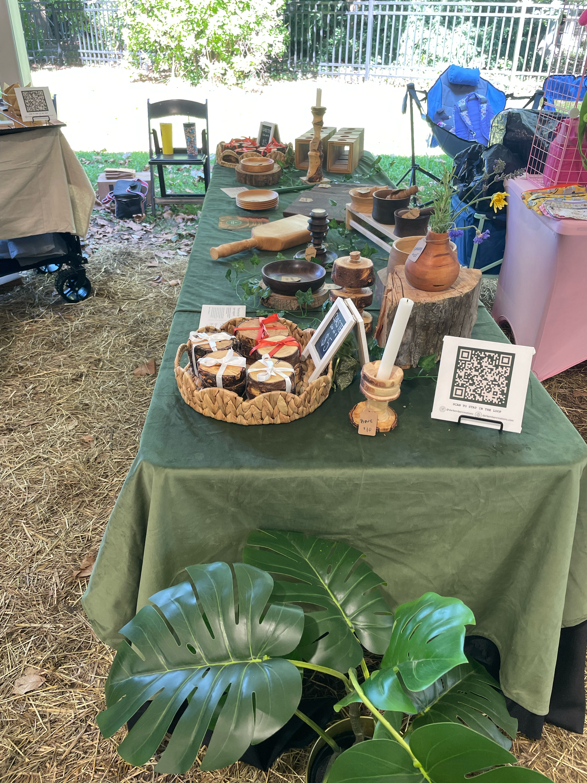 Front view of DEC market table with assorted goods for sale