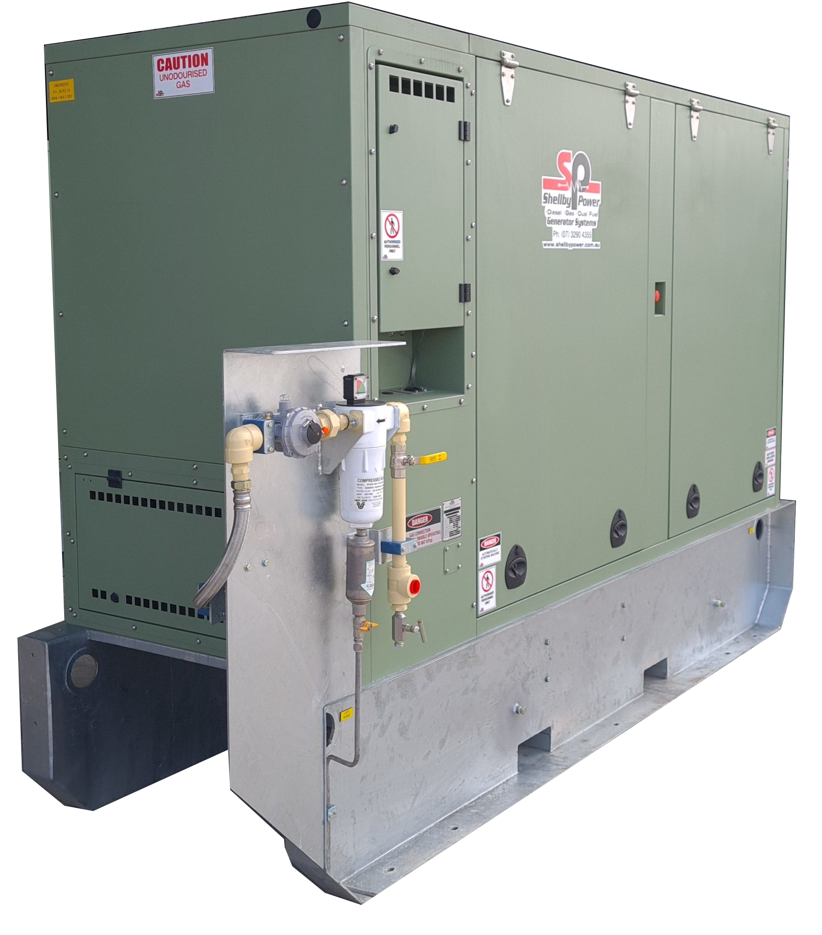 Industrial generator unit labeled 'Shelby Power' with warning signs, piping, and a control panel.