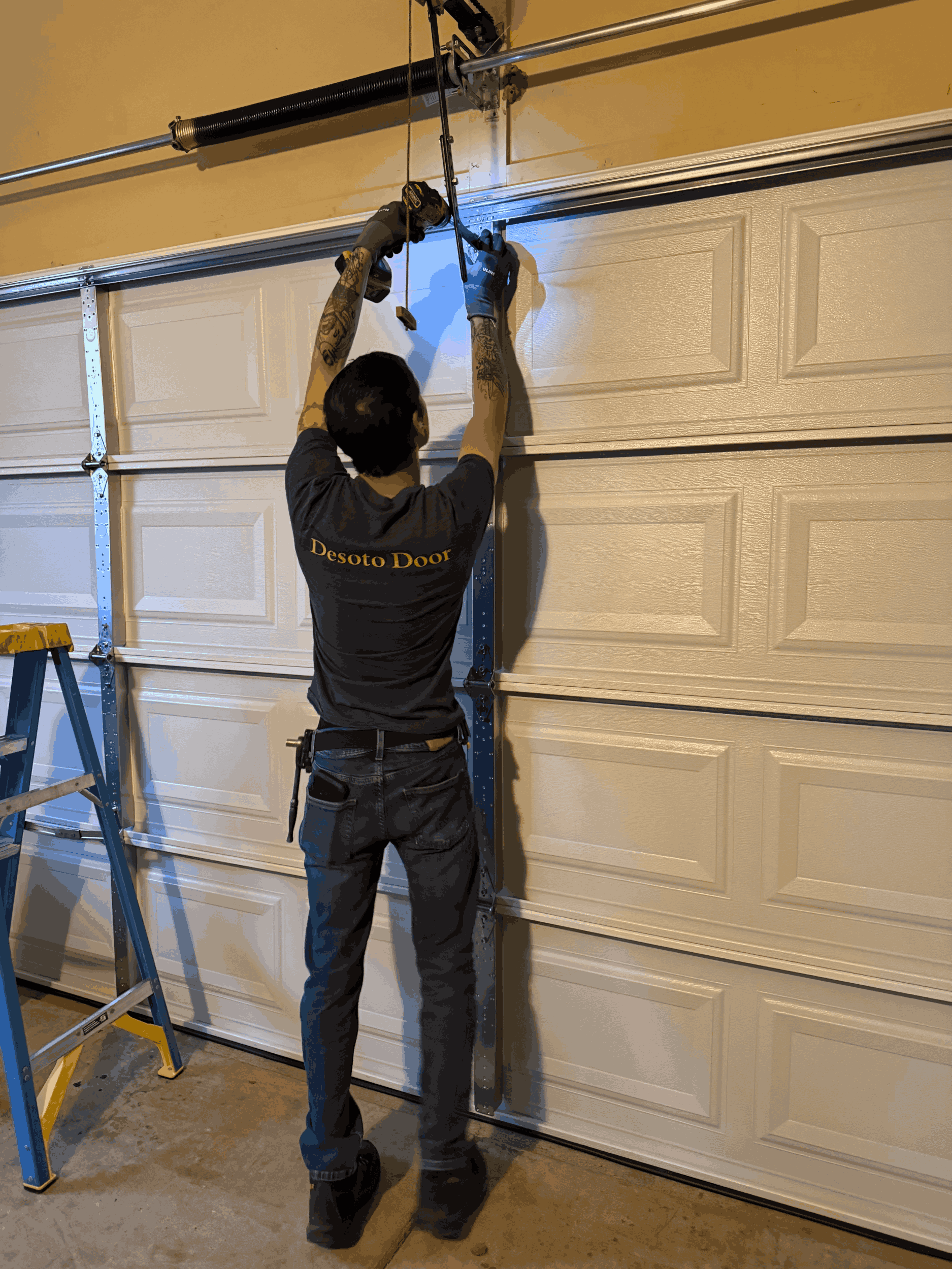 broken garage door spring repair by desoto door