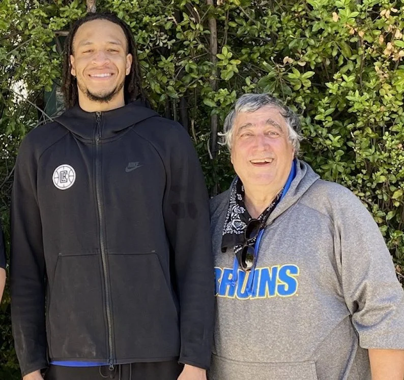 Elliott and Amir Coffey