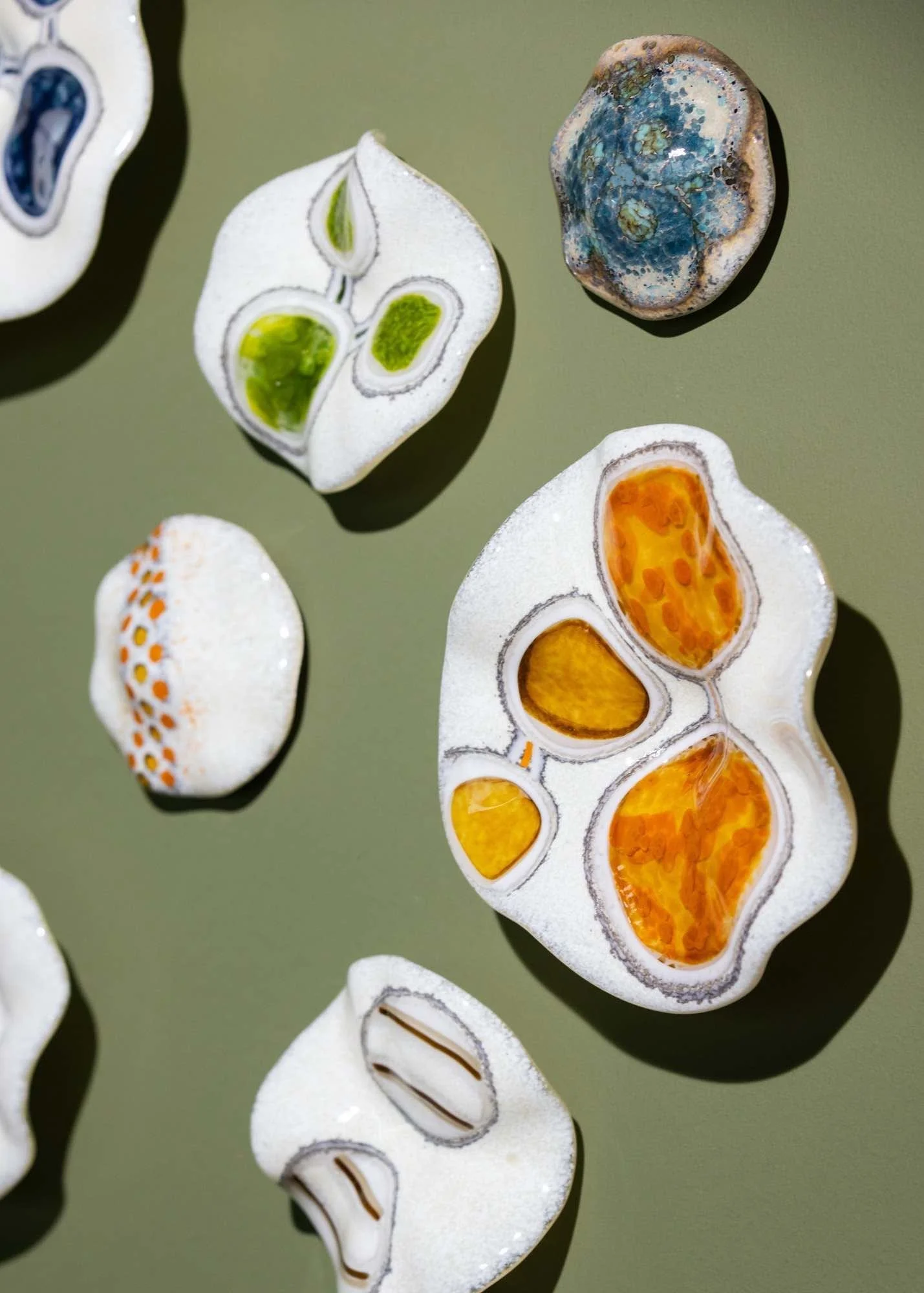 burnt-orange-sage-green-slumped-glass.jpg