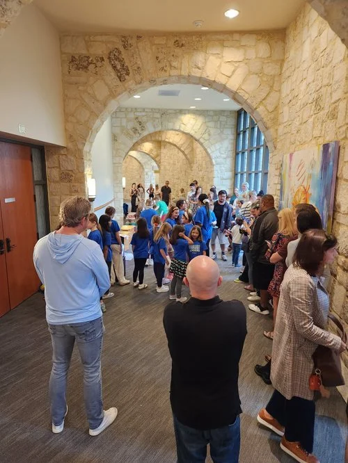 Guests gathering in the gallery during the Student Exhibition 2026