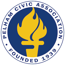 Seal of the Pelham Civic Association with a blue circle, white border, and a yellow flame in the center.