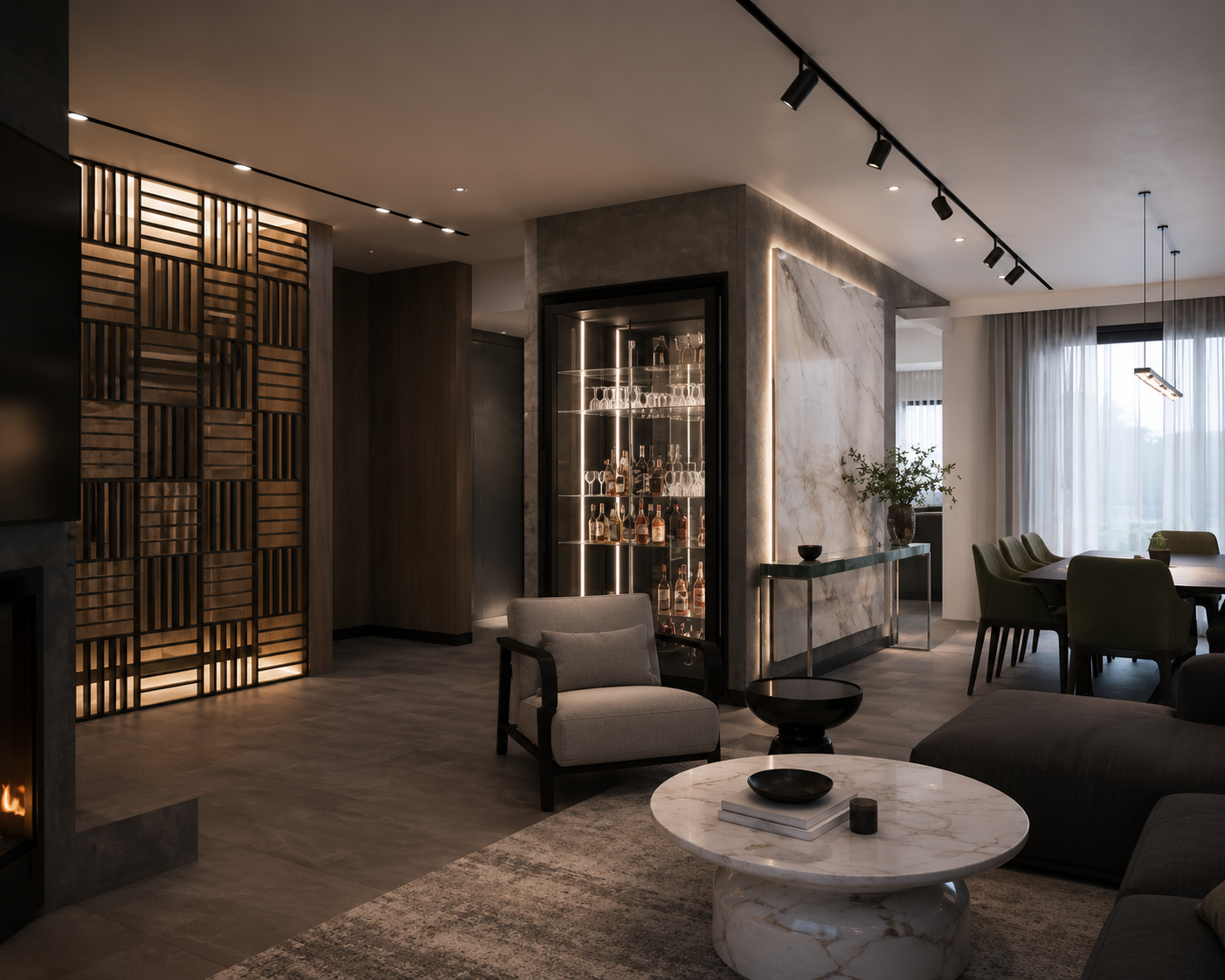 Modern living room with gray sofas, armchair, marble coffee table, glass display case with bottles, wooden panel decor, and large window with curtains.