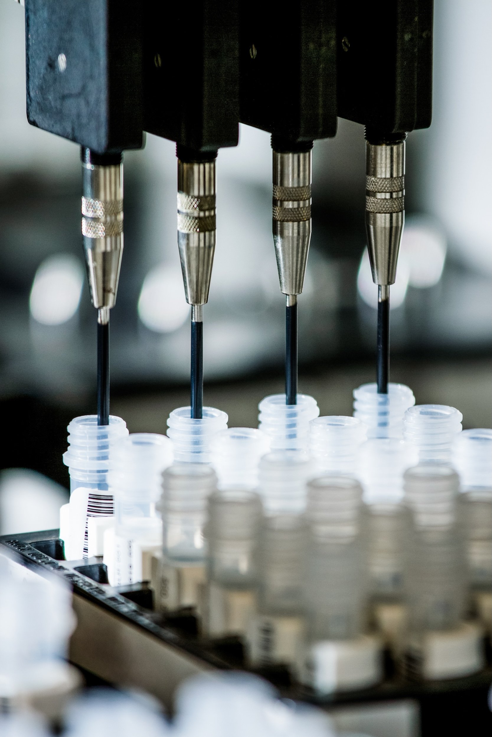 Photo of Biotech Vials Being Filled