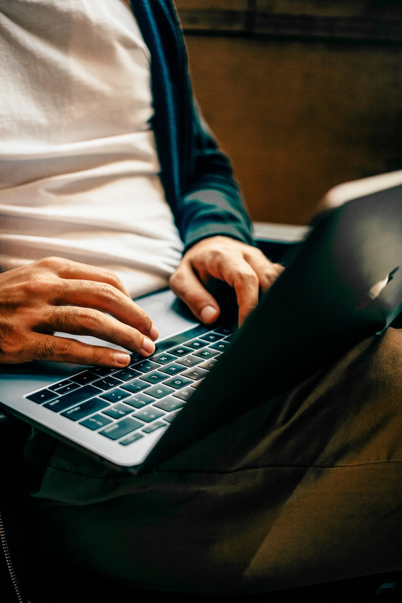 Photo of a Courier Customer Browsing the Nassau Transportation Website on a Laptop