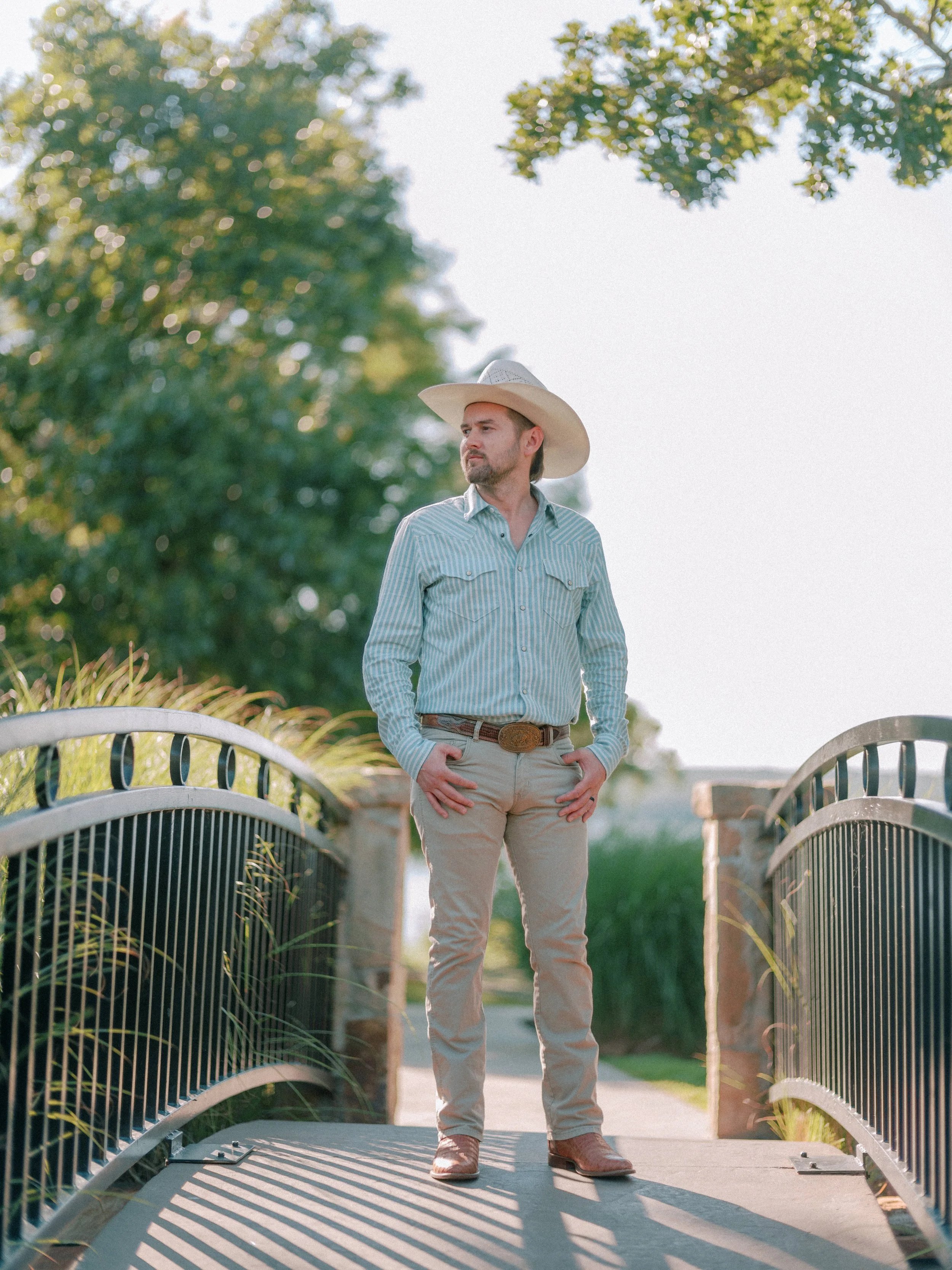 Portrait of the Palomino Film Co. photographer and filmmaker wearing a cowboy hat and western attire