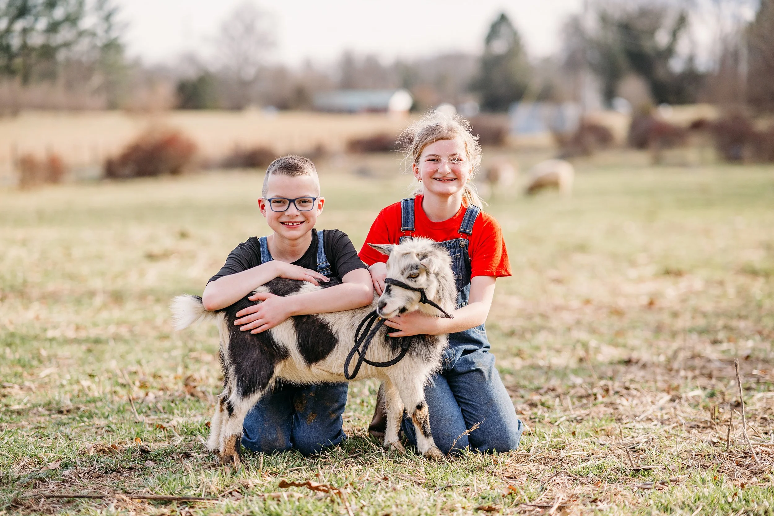 kids with goat