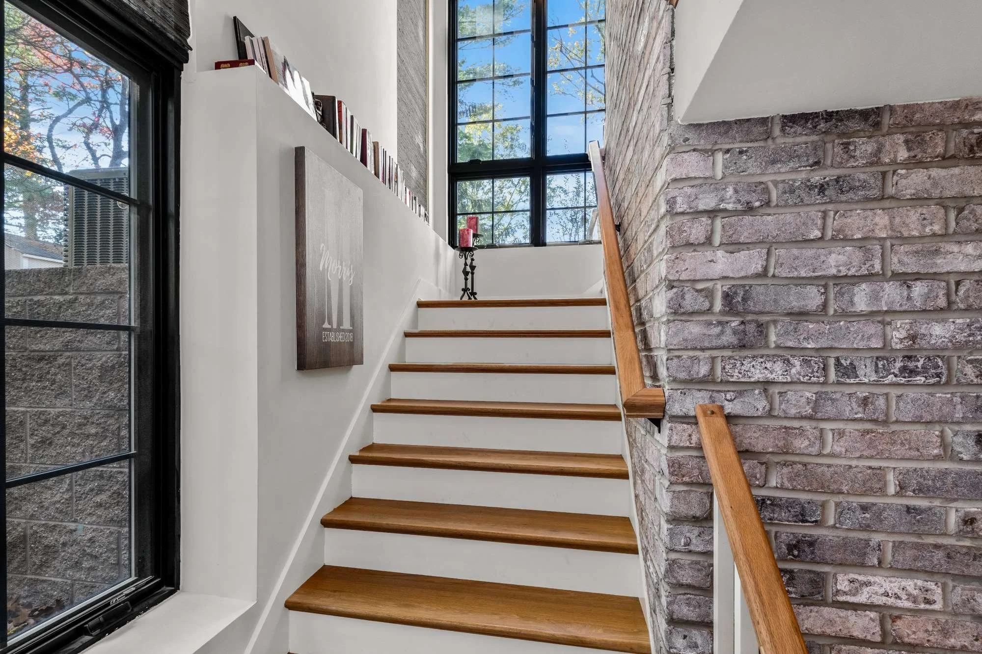 stairway-around-fireplace-lined-with-windows-haddonfield-nj.jpg