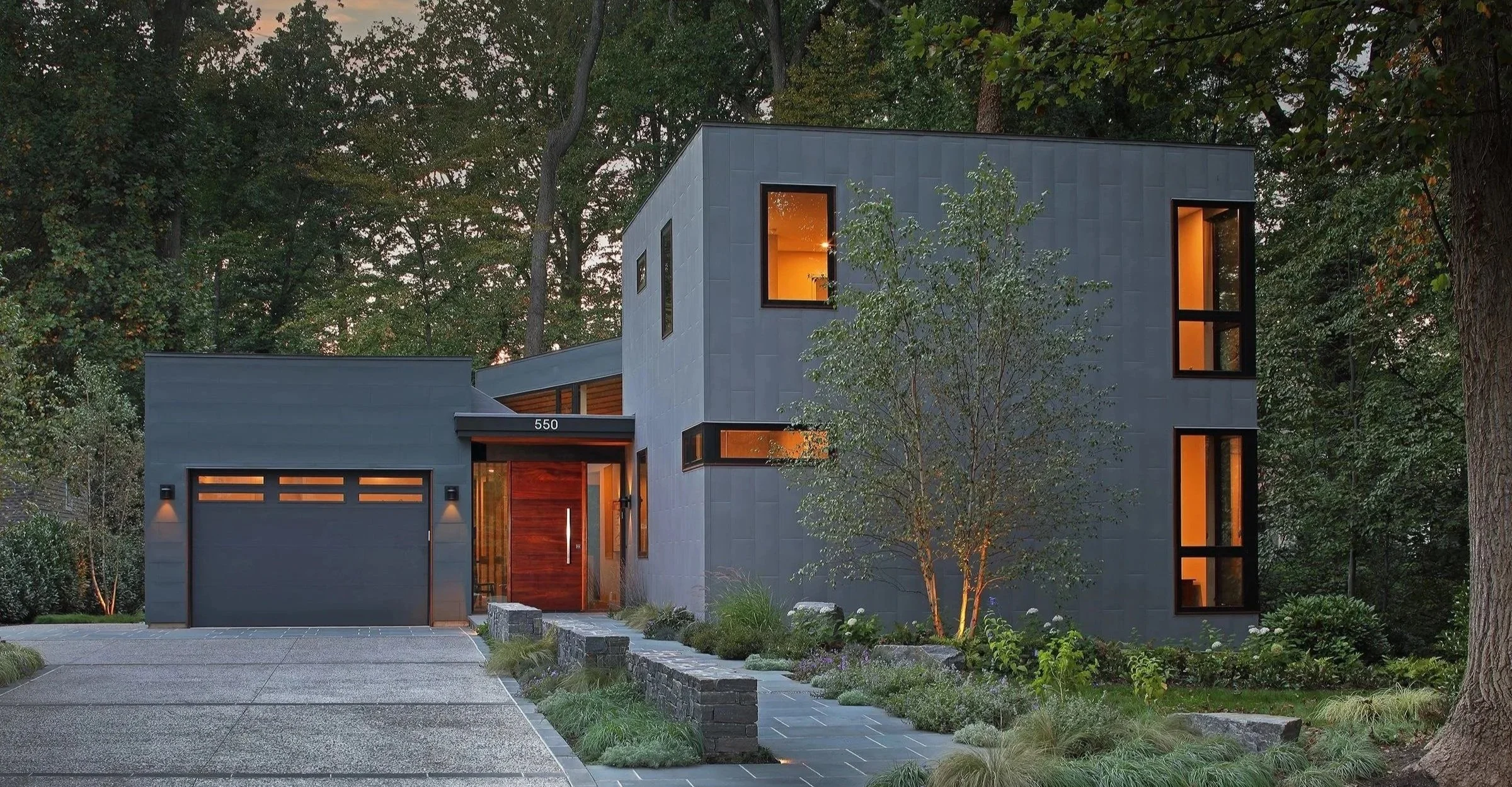 Custom modern home in Haddonfield, New Jersey designed by J Reinert Architecture with a strong connection to site, landscape, and natural light.