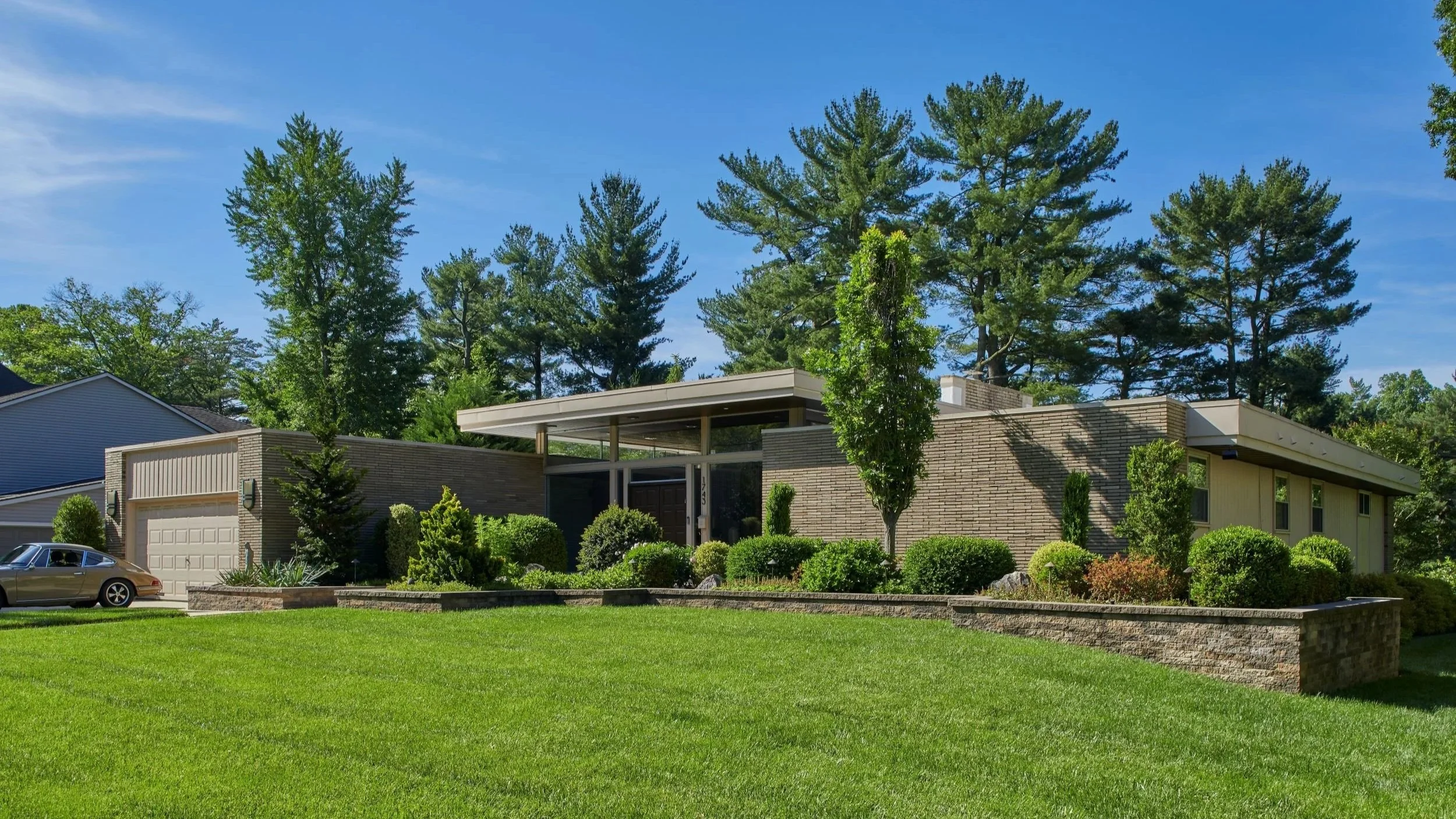 Mid-Century Modern Reclaimed, a Cherry Hill, NJ renovation restoring the character of a 1960s modern home while adapting it for contemporary family living.