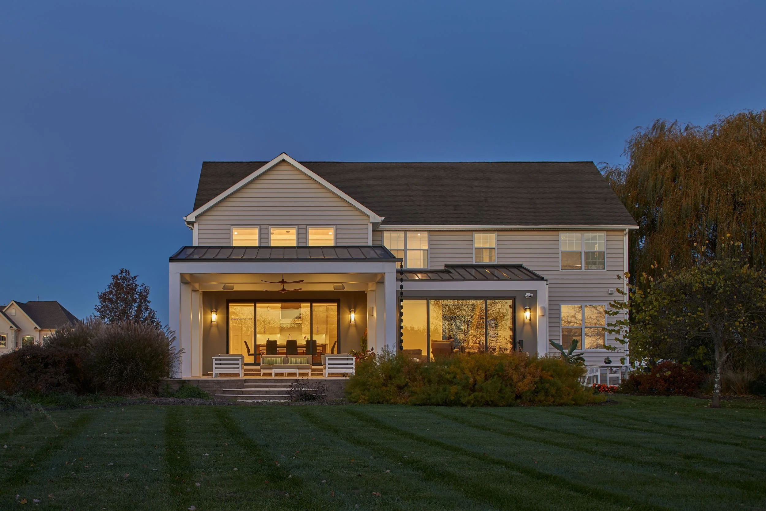 McMansion Makeover in Mullica Hill, NJ, transforming a 1990s developer home with clearer order, improved light, and a stronger connection to the backyard.