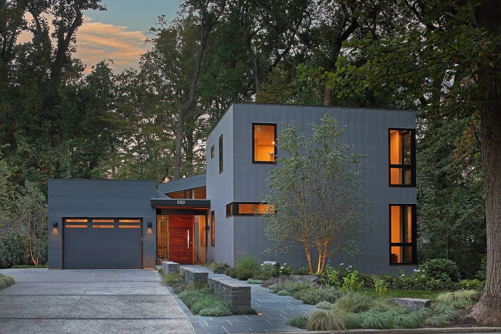 Custom modern home in Haddonfield, New Jersey designed by J Reinert Architecture with a strong connection to site, landscape, and natural light.