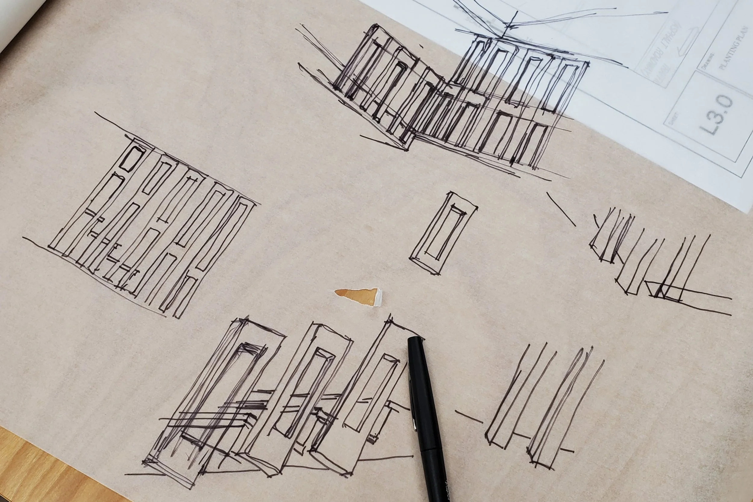 Design sketches for the CNC-fabricated sculptural stair railings at Hadro House — slat pattern studies drawn on trace paper over the construction drawings