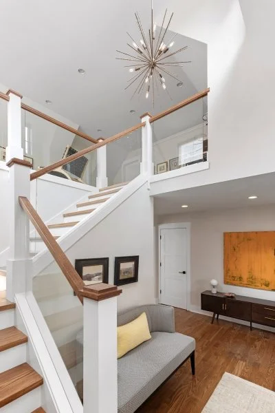 contemporary-craftsman-front-foyer-glass-stair-art-work-haddon-heights-nj.jpg