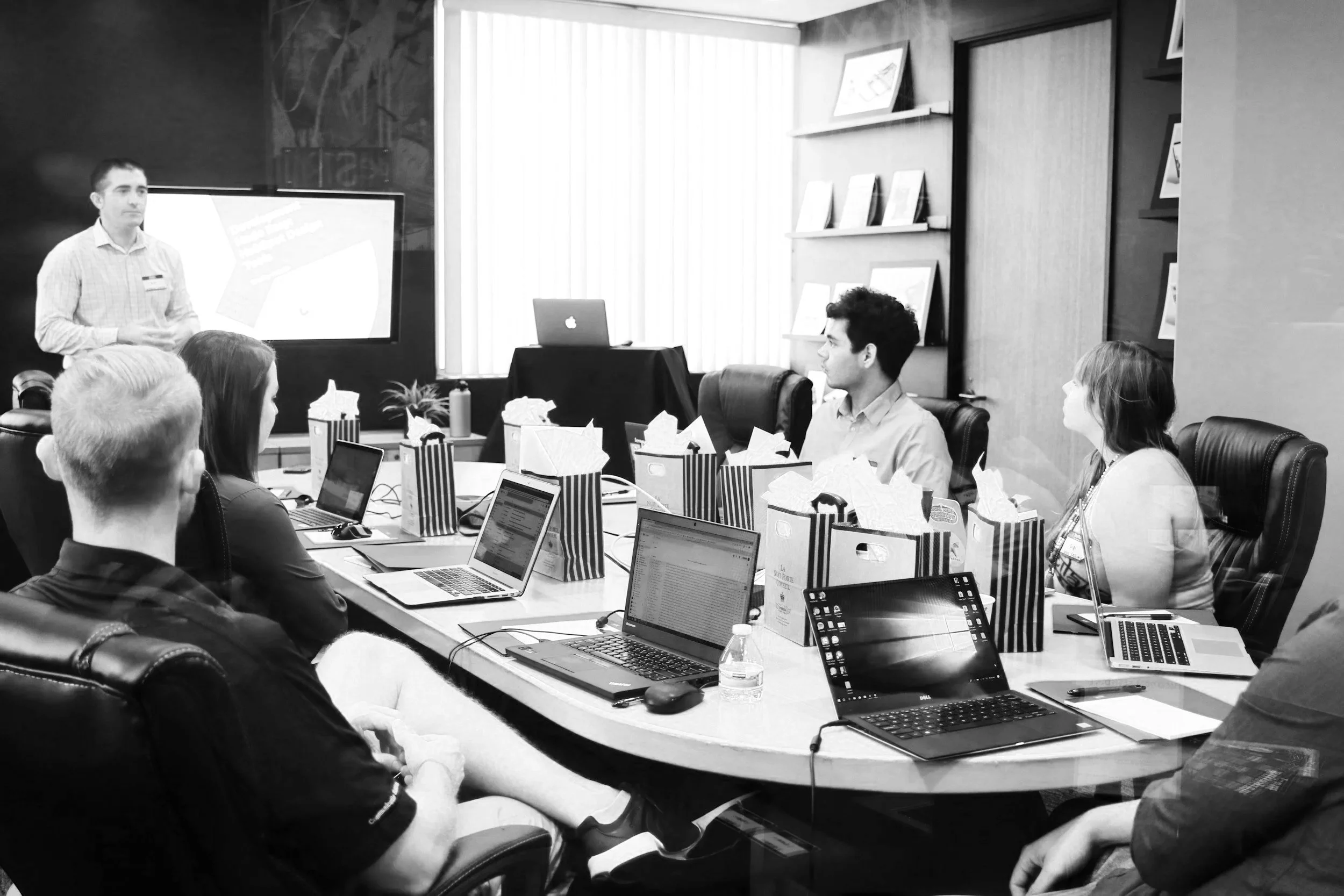 Law firm team working together in an office, representing employee onboarding and HR operations