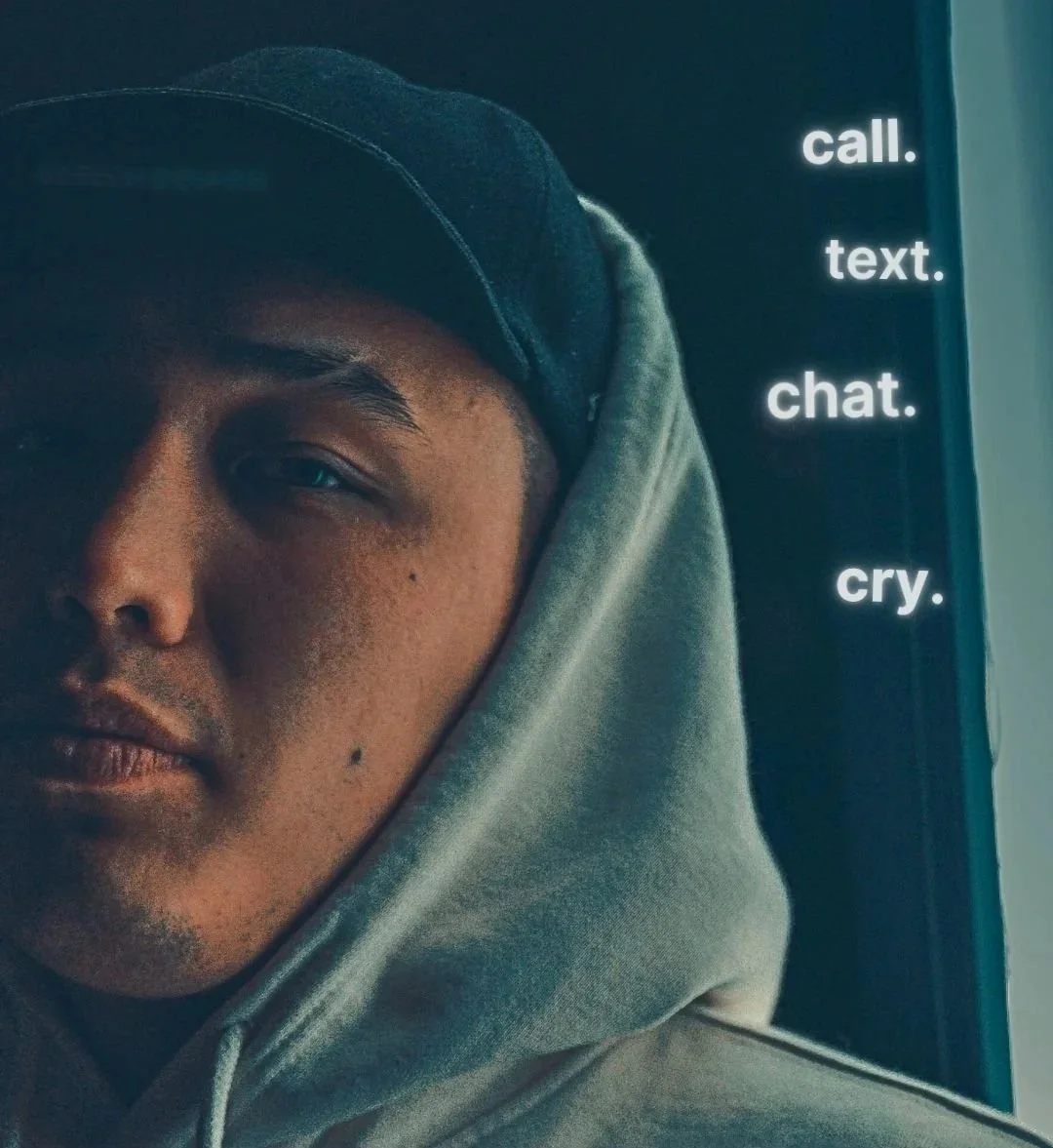 Youthline portrait of a young person in a hood beside the words “call. text. chat. cry.”