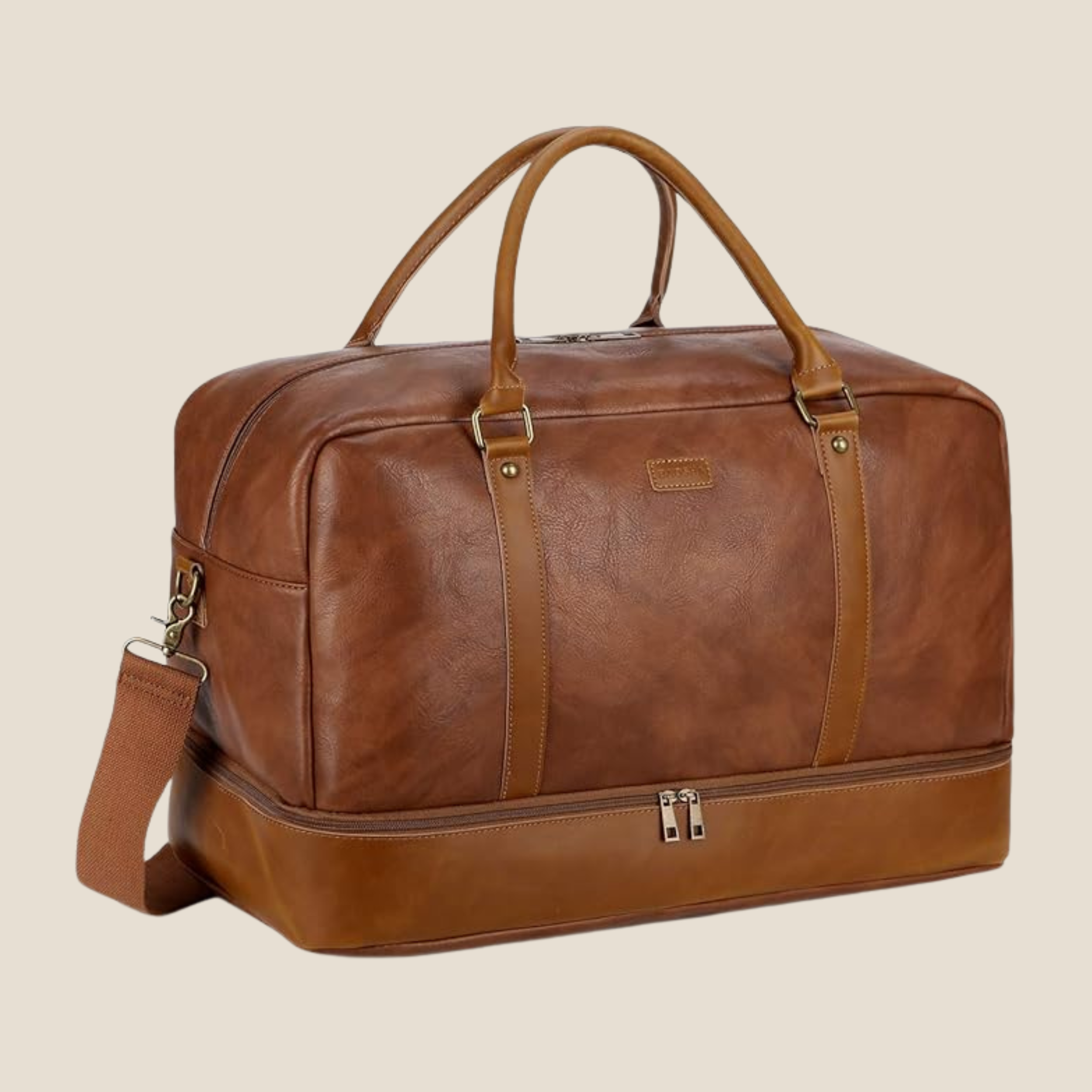 Brown faux-leather weekender bag with double handles and a zippered bottom shoe compartment, shown at an angle.