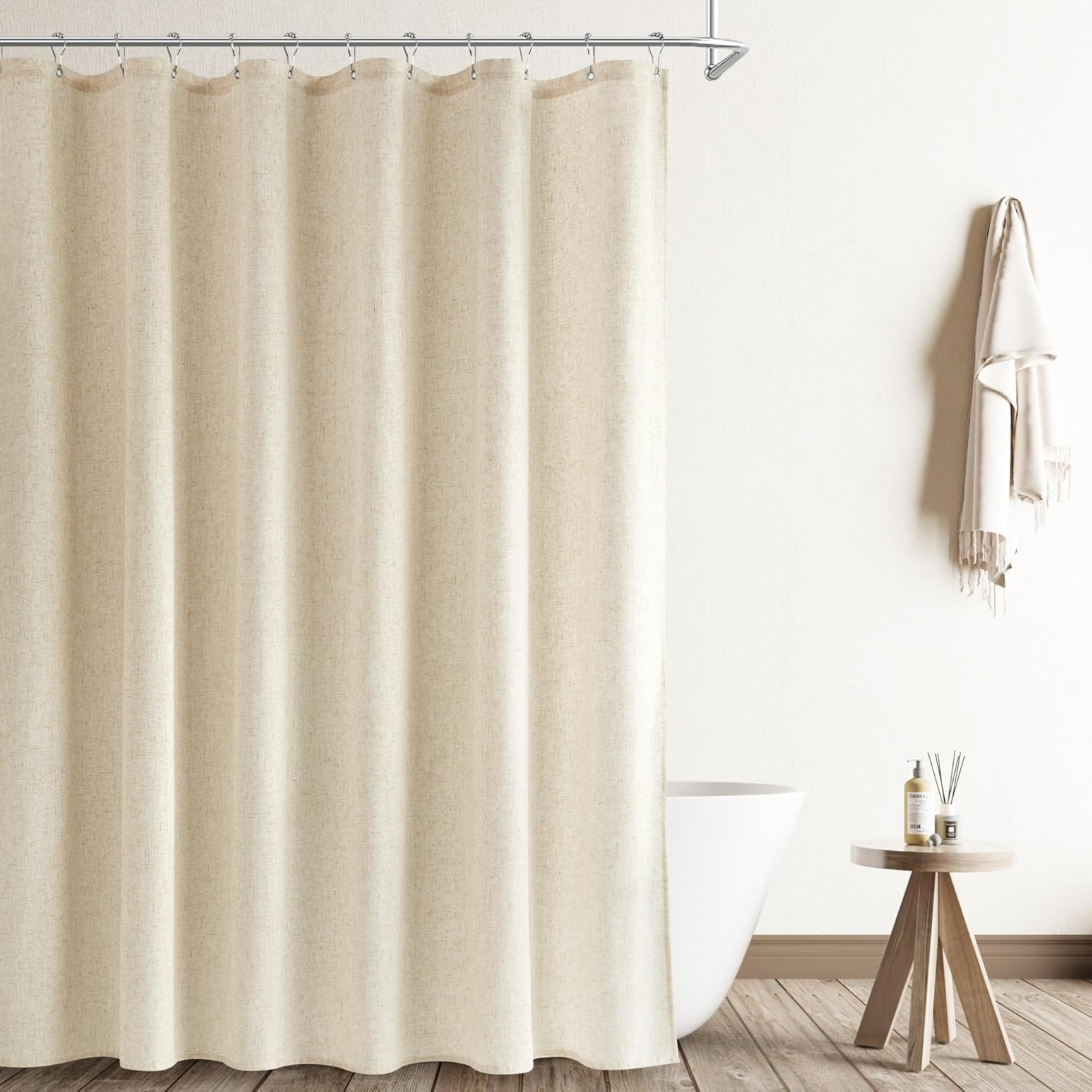 Natural flax linen shower curtain hanging in a bright bathroom with soft filtered light — bathroom refresh from The Alcove Edit