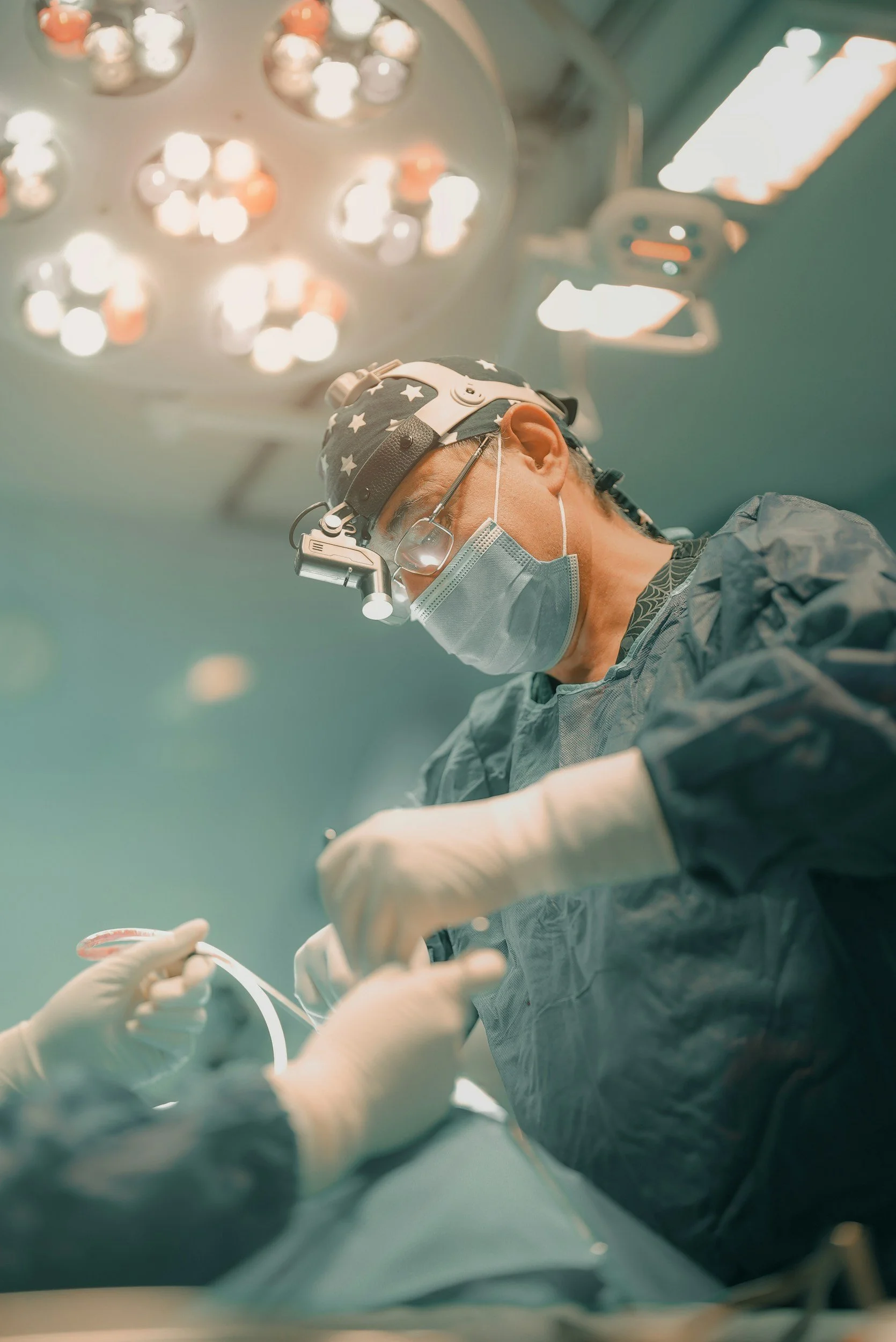Surgeon with Surgery Equipment, Surgical Mask, Surgical gown, Face Mask