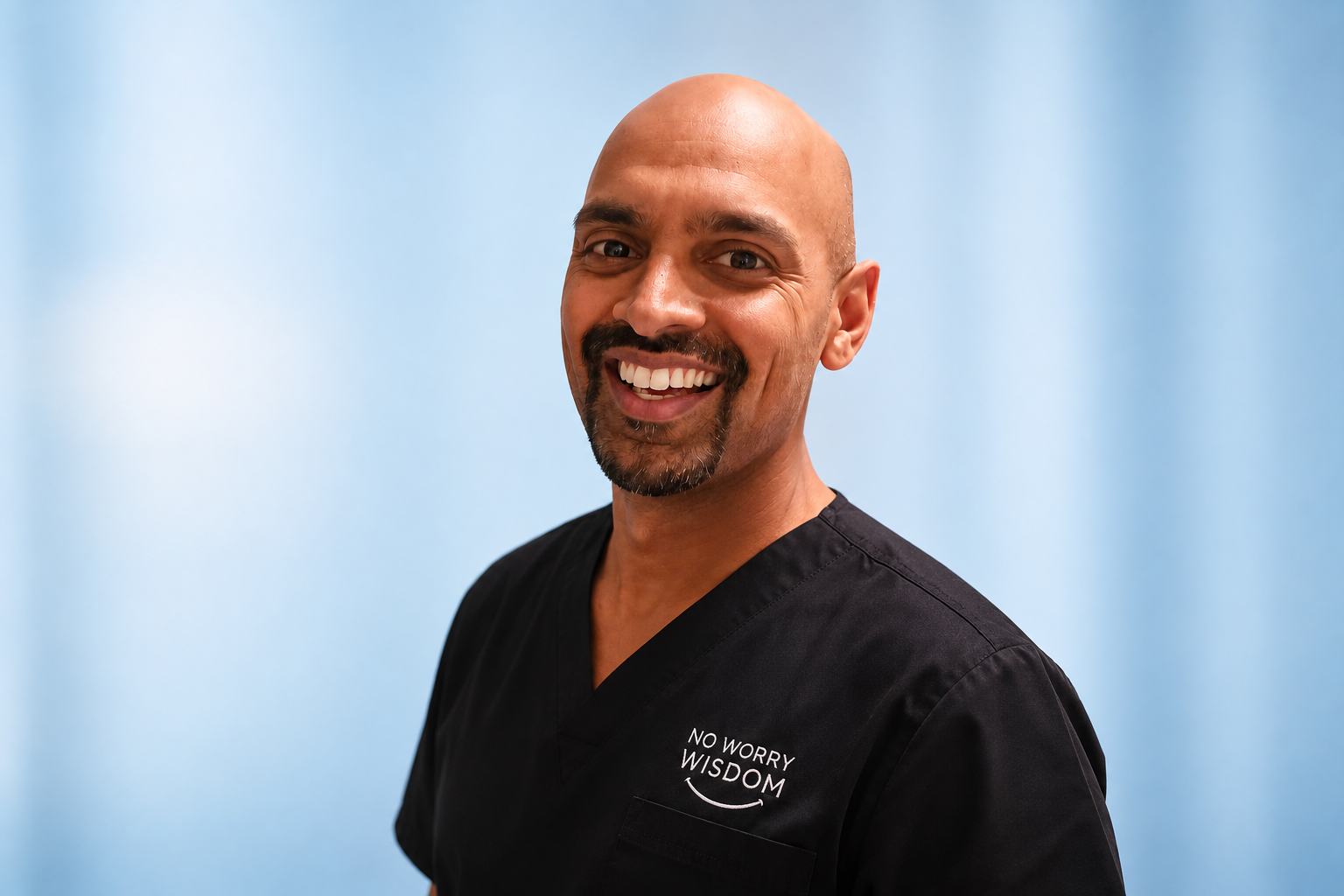 Photo of Dr Leon smiling