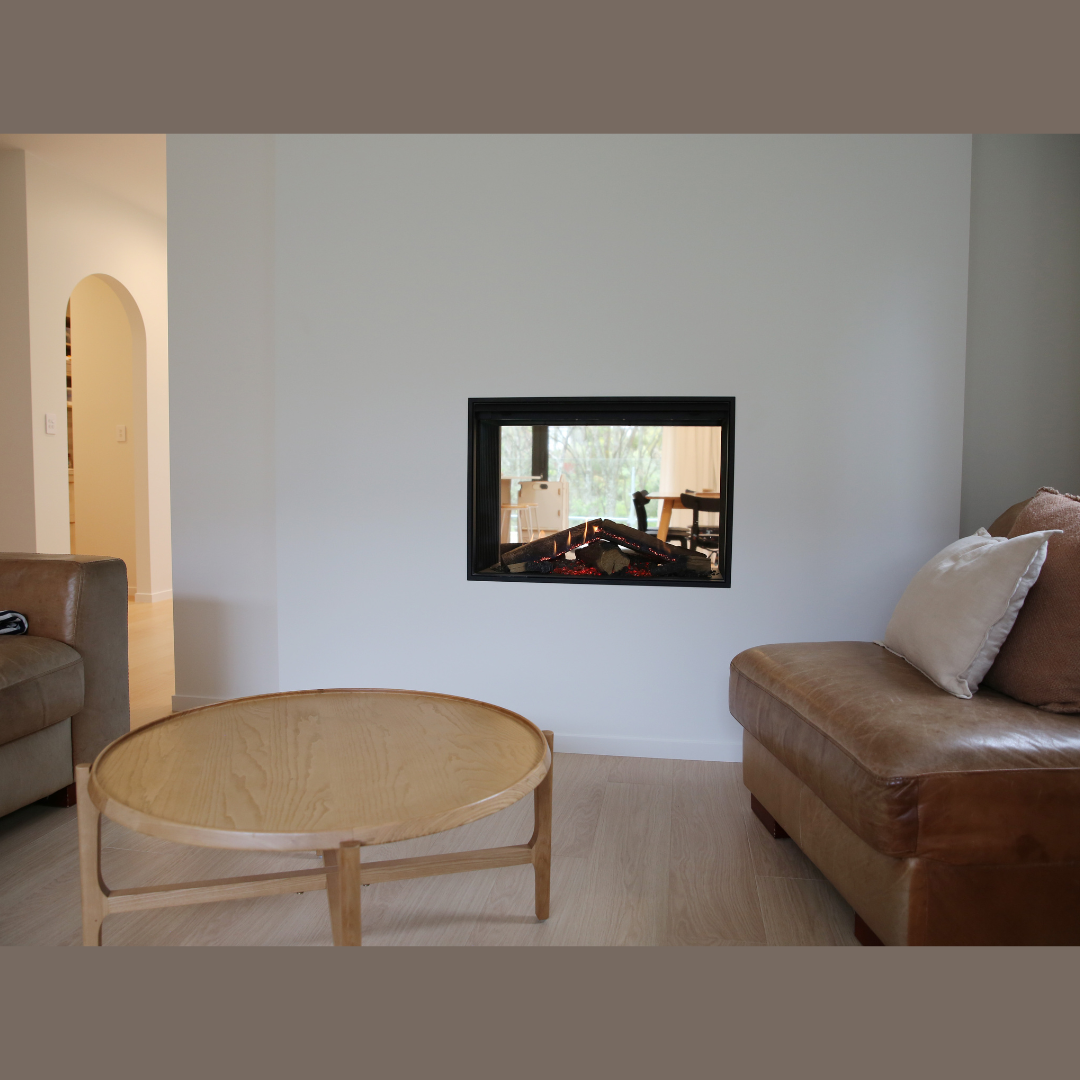 Cosy modern lounge with gas in-wall fireplace lit