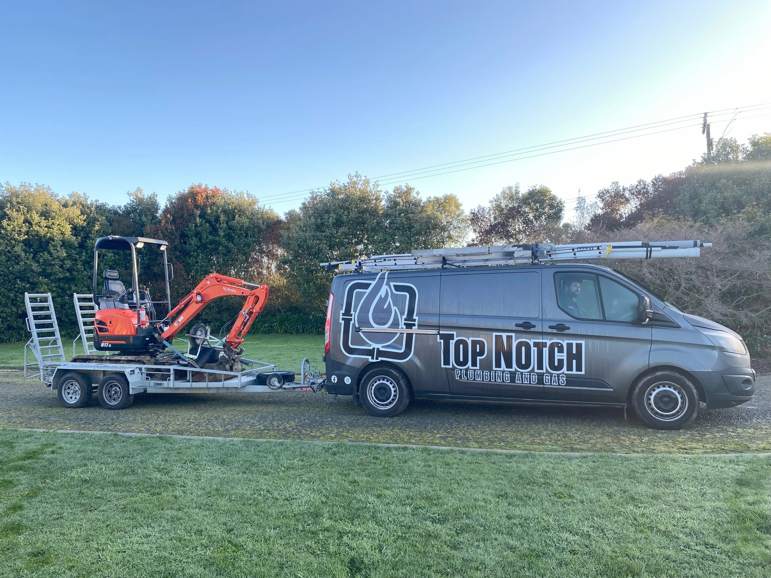 Top Notch Plumbing and Gas Van and Digger