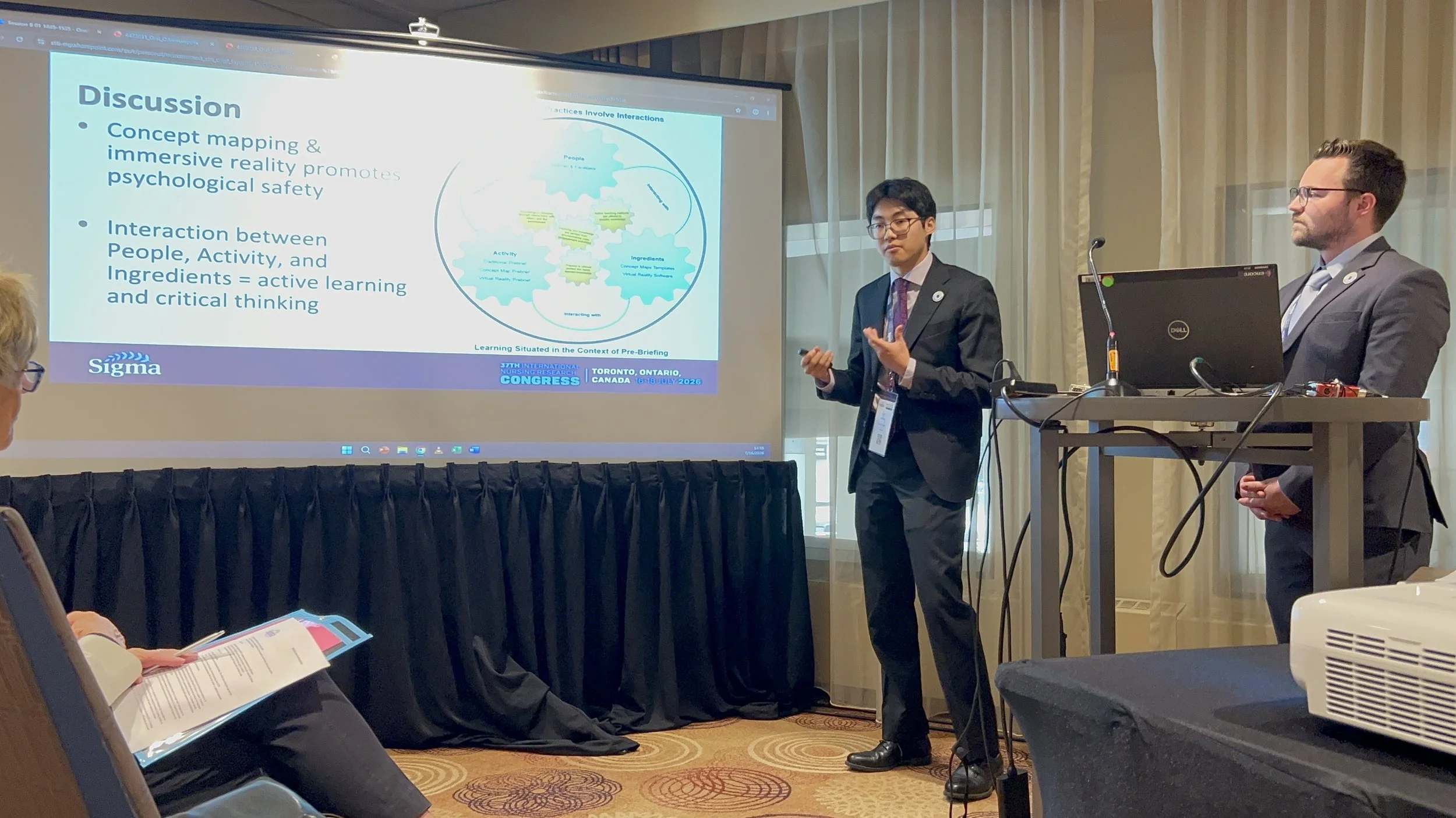 Ryan McNally (Left) & Christian Baltus (Right), presenting findings from ONSET's RCT study