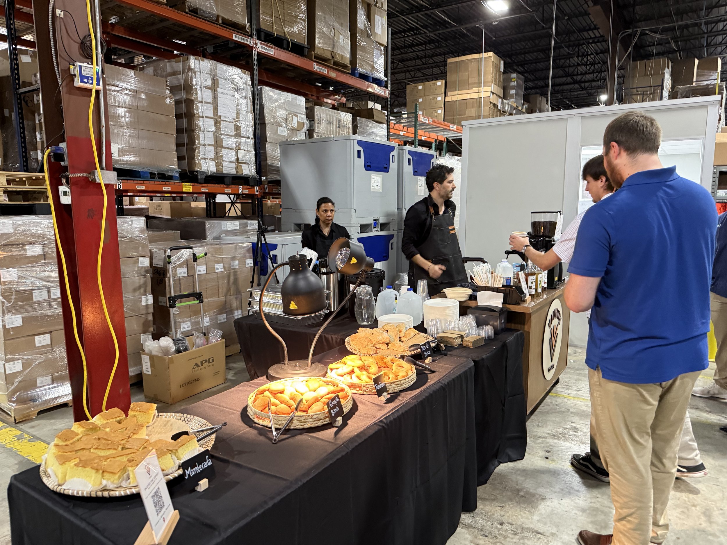 Mobile coffee catering service providing savory bites and artisan pastries for a corporate brunch.